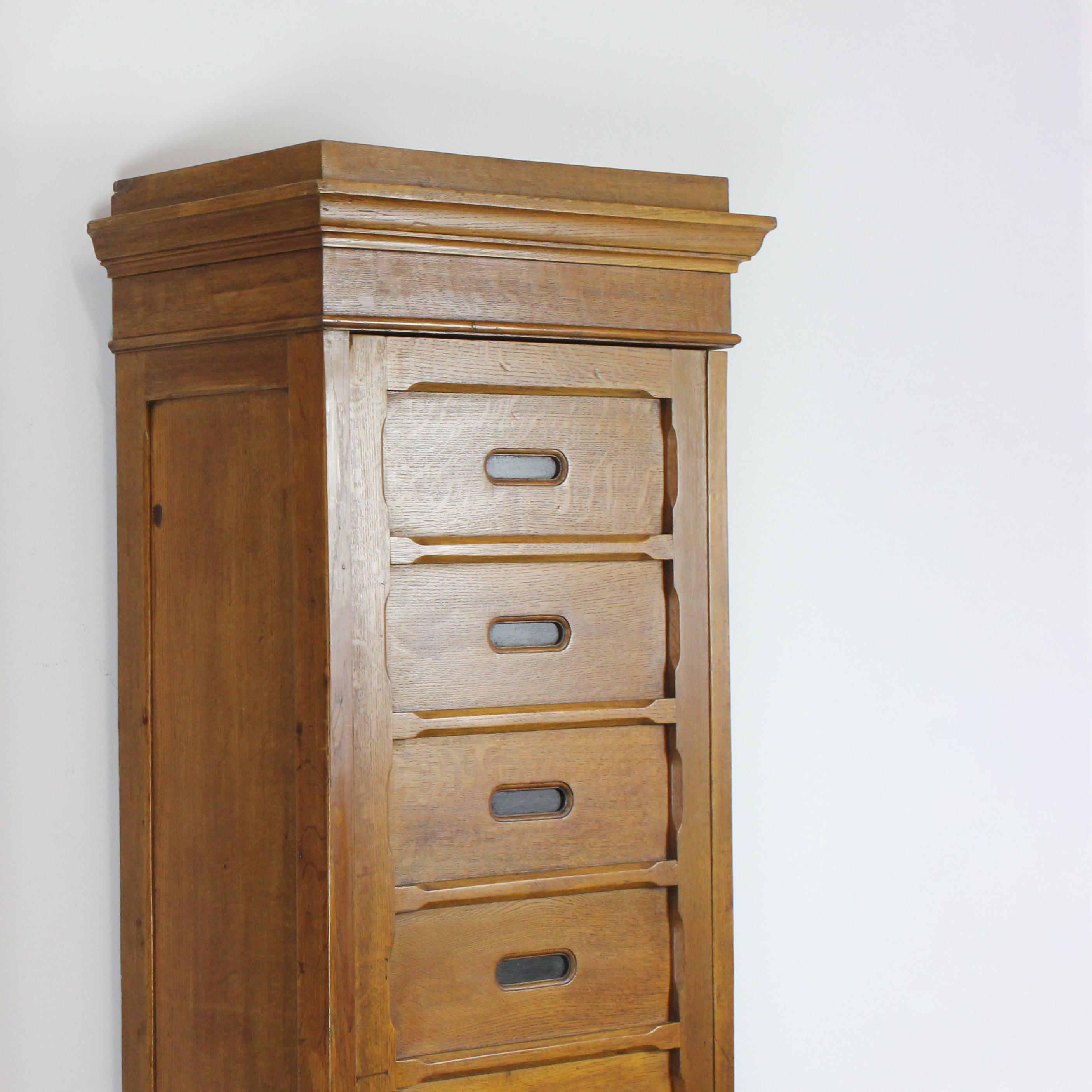 European Pair of oak wardrobes with doors and locks. Shelves inside (one adjustable). For Sale