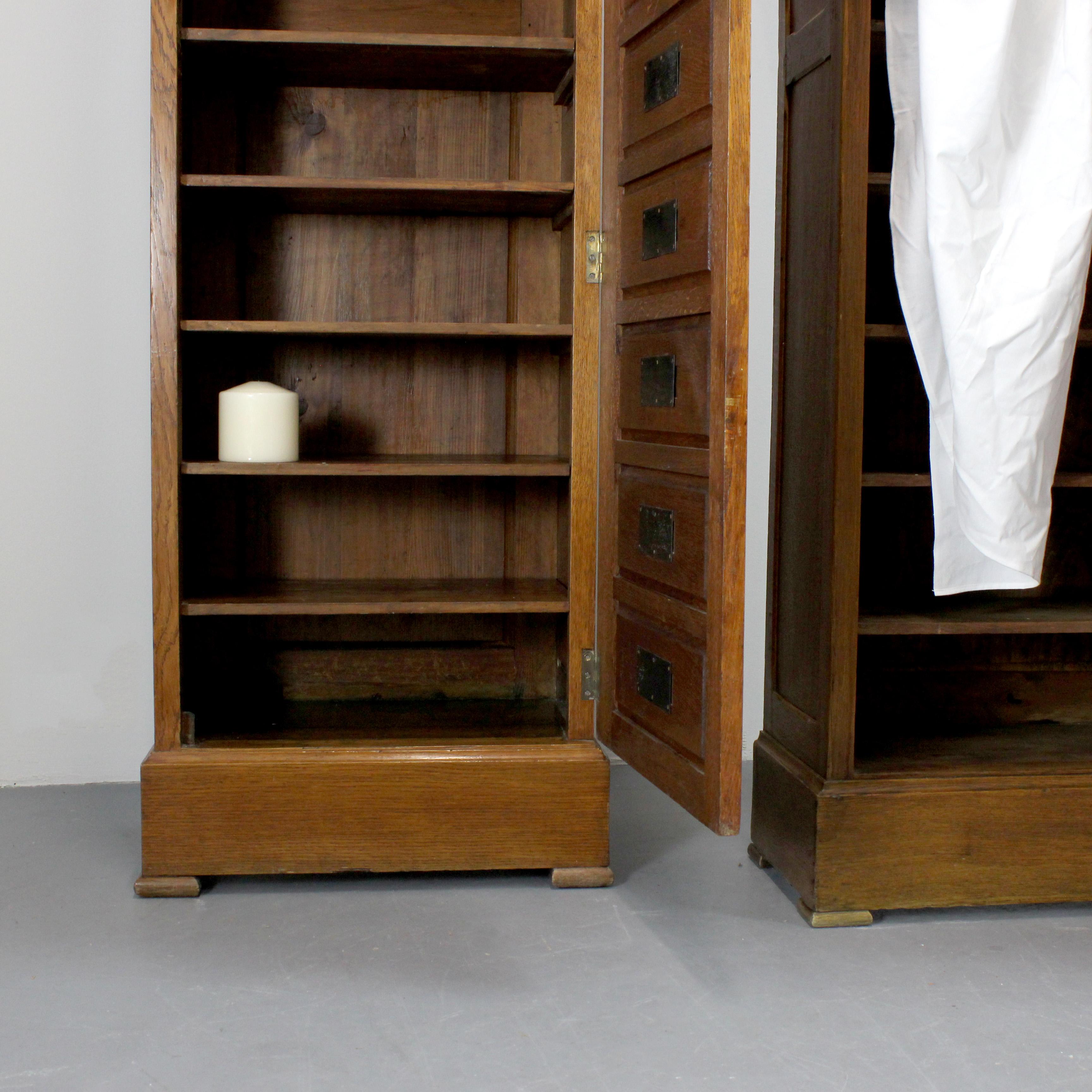Pair of oak wardrobes with doors and locks. Shelves inside (one adjustable). For Sale 3