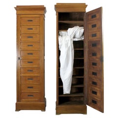 Antique Pair of oak wardrobes with doors and locks. Shelves inside (one adjustable).