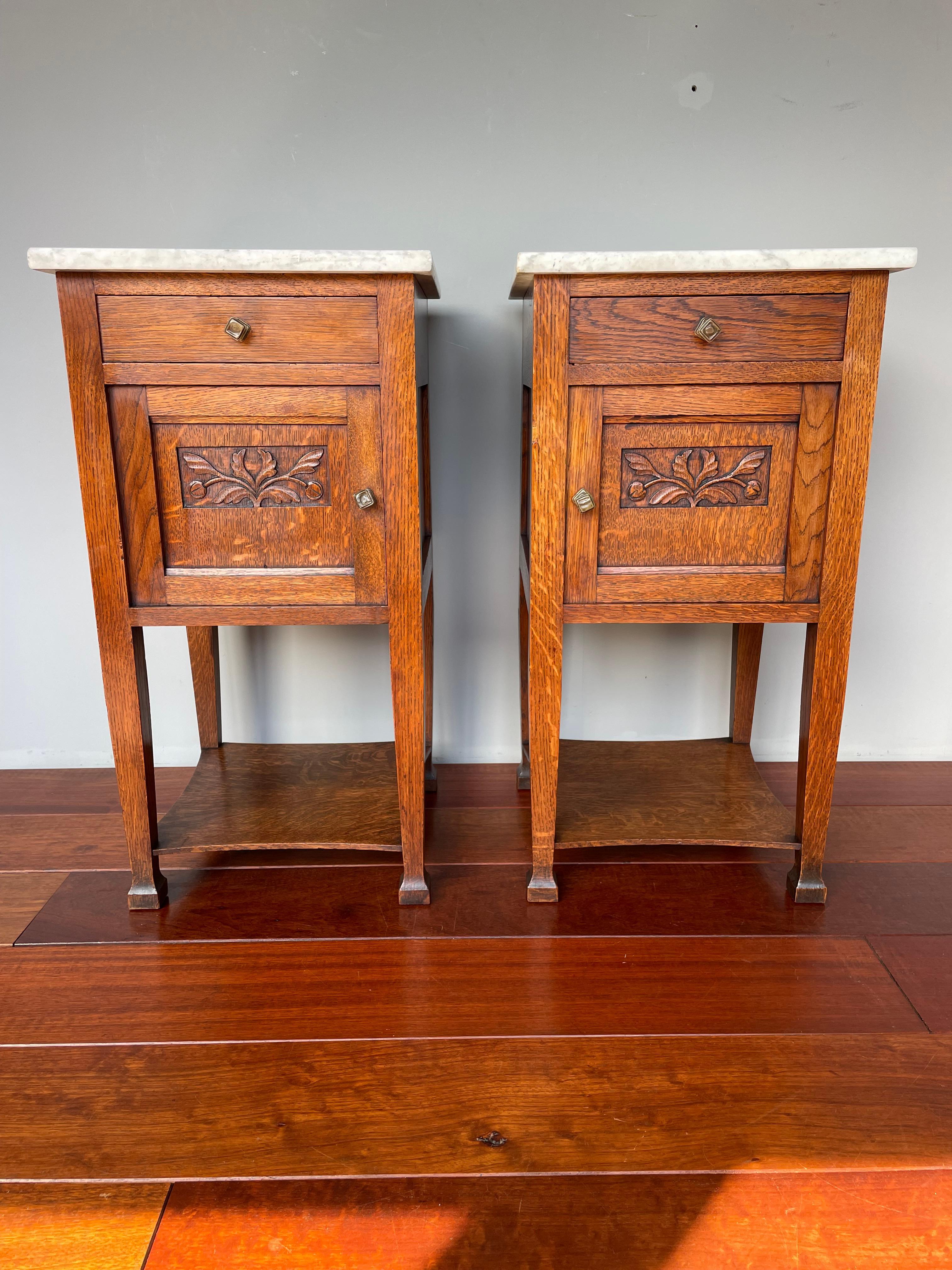 Beautiful and practical pair of Dutch Arts & Crafts nightstands with white & black marble tops.

If you are looking for timeless and beautifully handcrafted bedside cabinets then this Arts & Crafts pair could be yours to own and enjoy soon. They