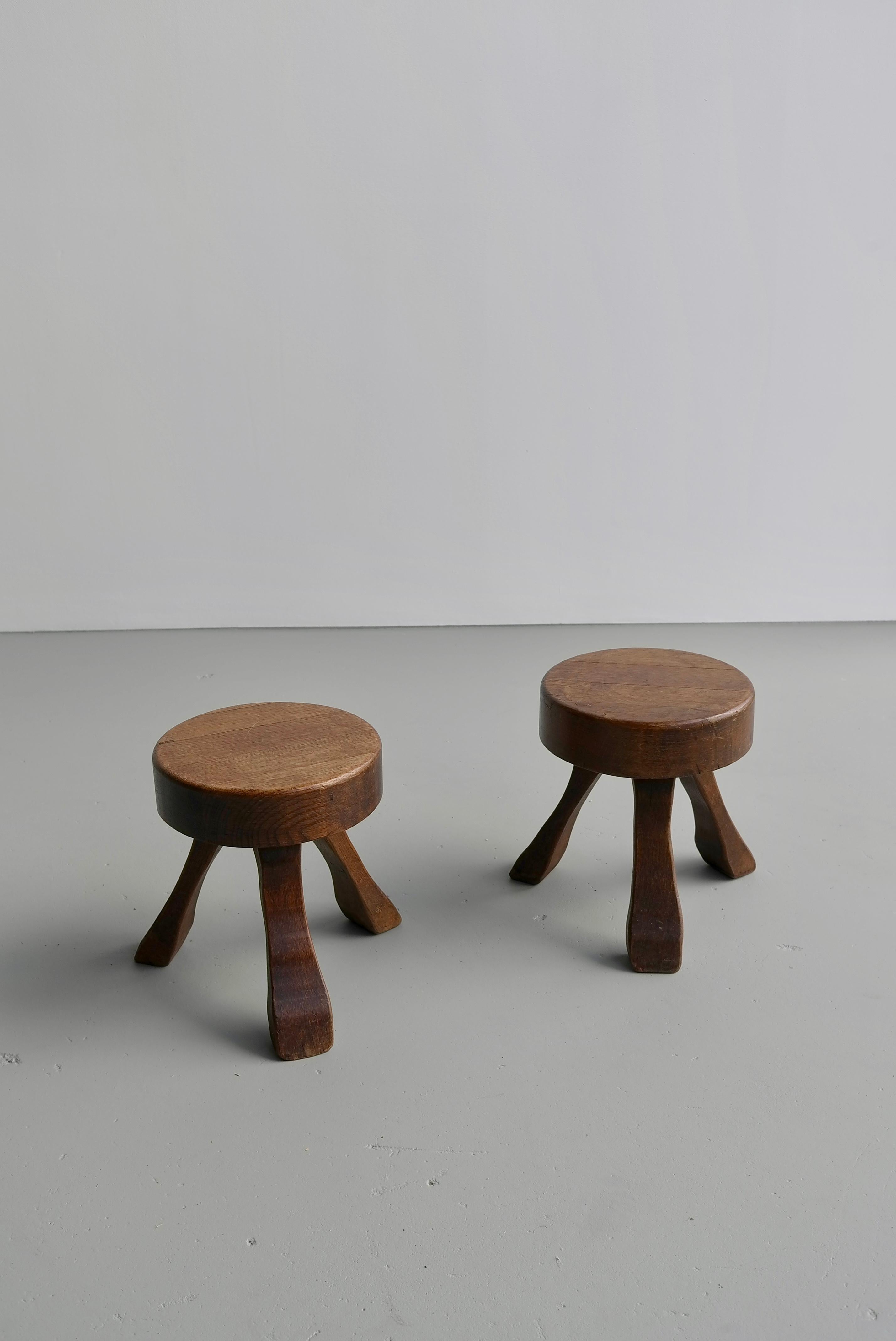 Pair of oak wooden stools in style of Charlotte Perriand.