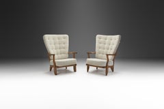Pair of Oaken “Grand Repos” Lounge Chairs by Guillerme et Chambron, France 1950s