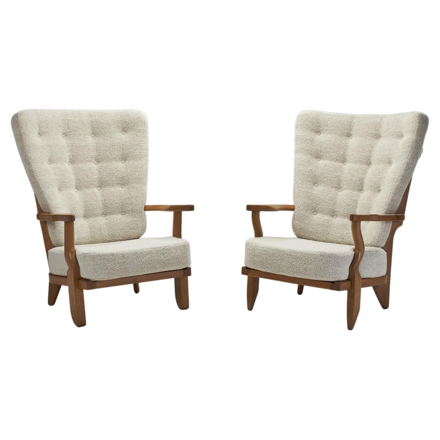 Pair of Oaken “Grand Repos” Lounge Chairs by Guillerme et Chambron, France 1950s