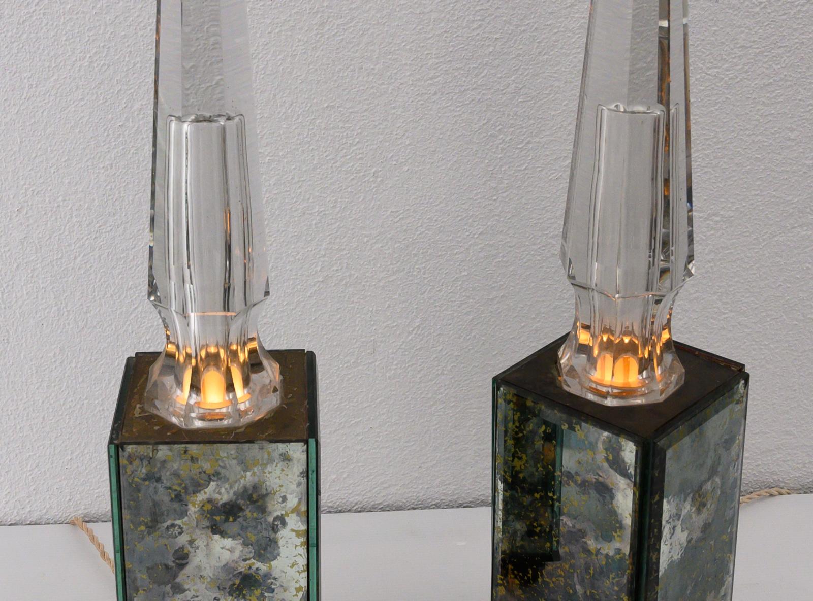 Stylish pair of mirrored and crystal obelisk lights in the style of Serge Roche attributed to Baccarat
France circa 1940 
Provenance: Ex-collection Serge Merlin, French actor, gained notoriety for his role in the film Amélie
( priced for the
