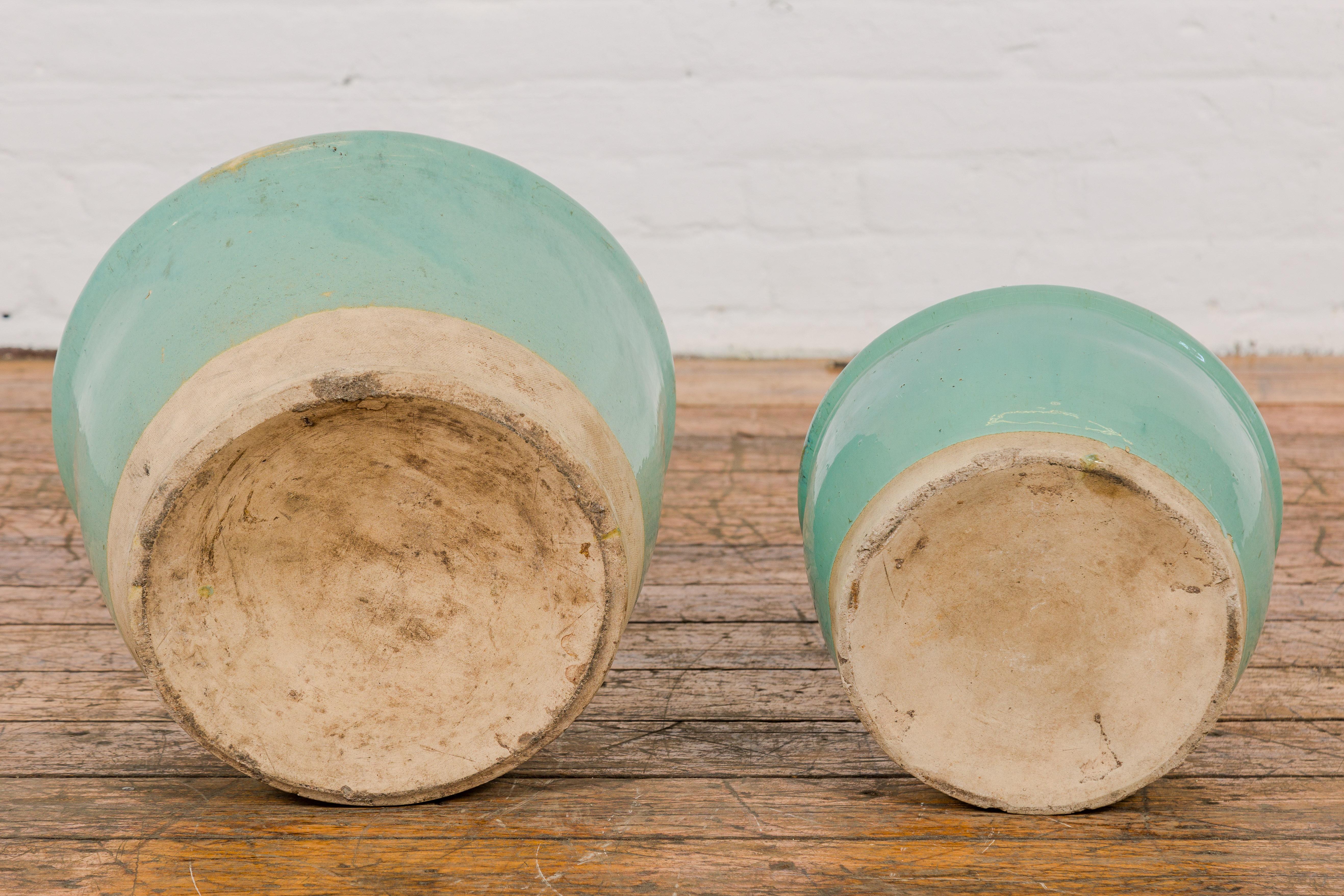 Pair of Ocean Blue Glazed Ceramic Round Nested Planters with Tapering Lines For Sale 11