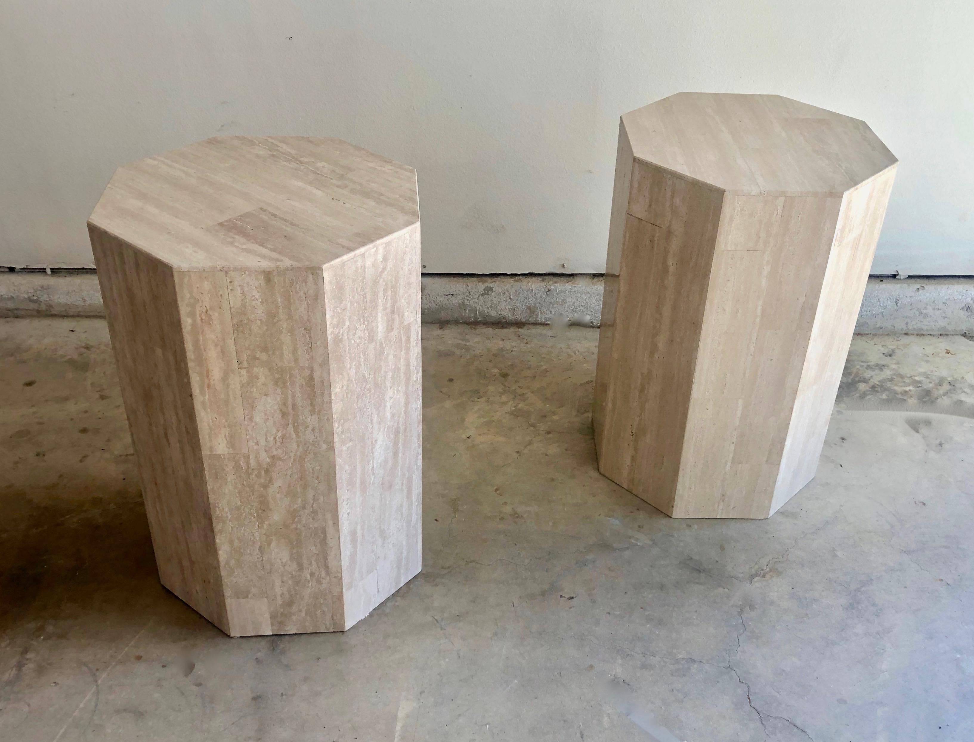 Pair of travertine octagon pedestals or columns that can be used as a plant stand or sculpture stand.
A glass top could be made to convert into a dining table base if desired