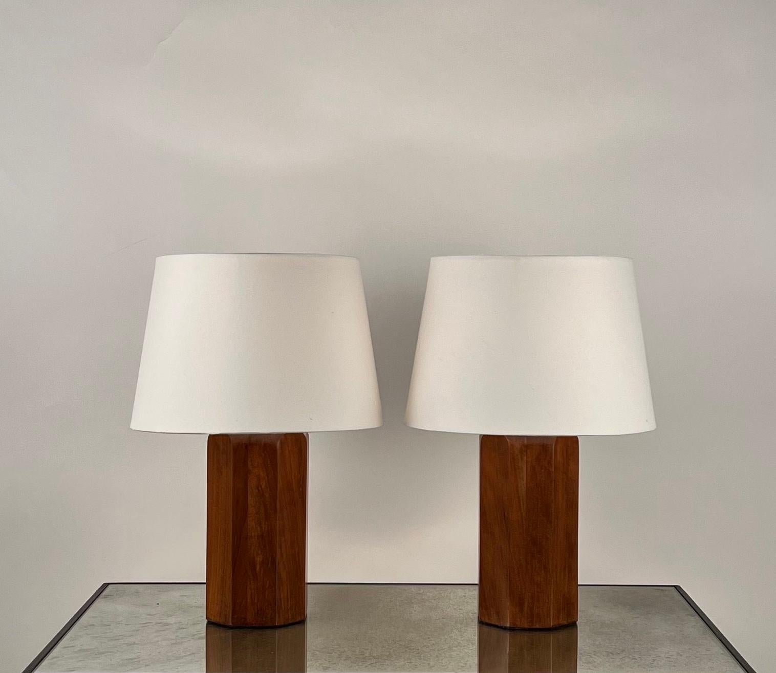 Pair of 'Octogone' walnut table lamps with parchment shades by DESIGN FRÈRES®.

An attractive, understated combination of polished walnut geometric bases and European style parchment shades (no harps or finials).

Dimensions listed are with the
