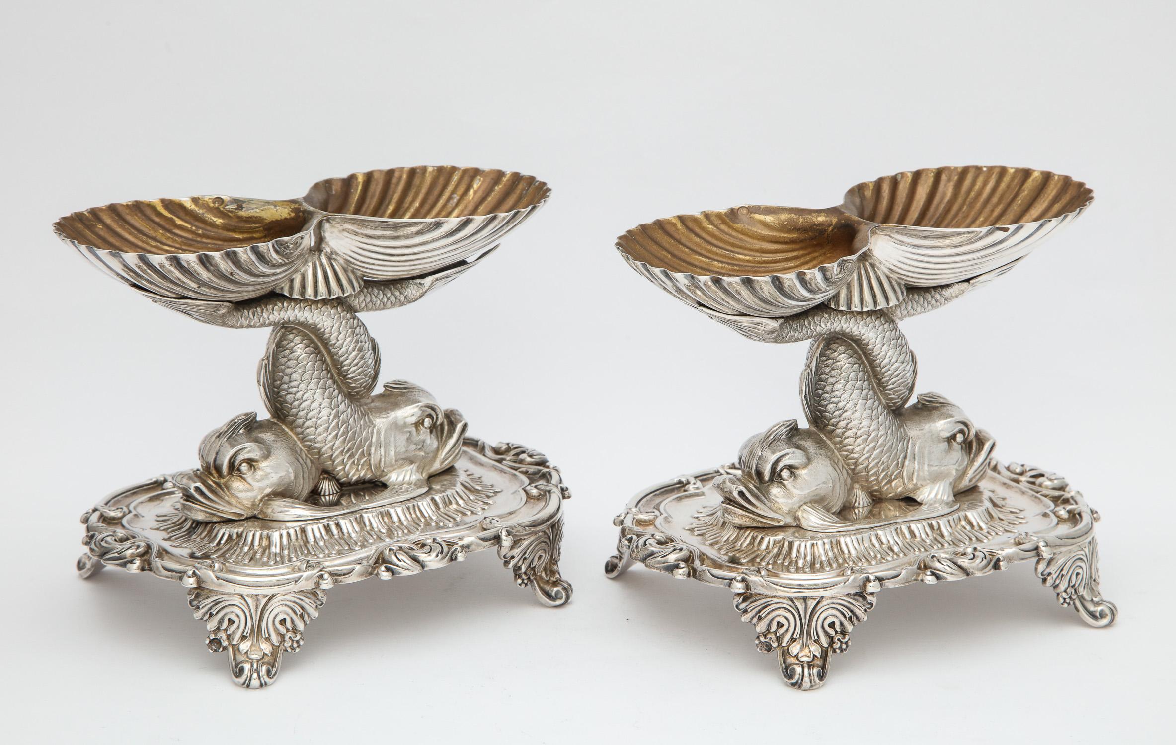 Early 19th Century Pair of Odiot Neoclassical Sterling Silver Dolphin-Form Salt Cellars