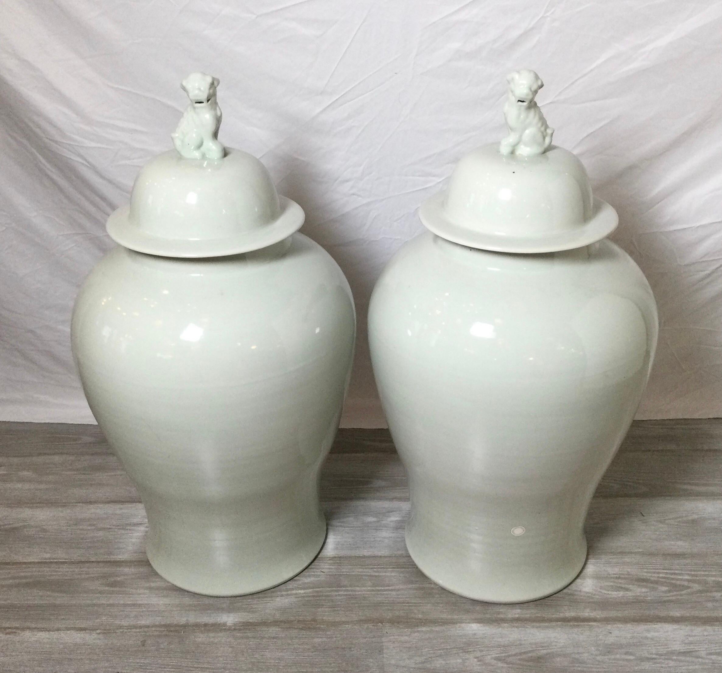 Pair of late 20th century off white Blanc De Chine Monumental porcelain temple jars 
Purchased at a top design retailer in Hong Kong, Charlotte Horstmann & Gerald Godfrey Ltd.
Dimensions: 18' Diameter x 31