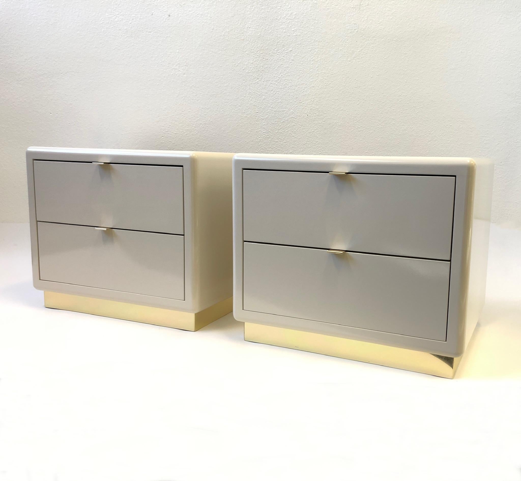 American Pair of off White Lacquered and Brass Nightstands by Steve Chase