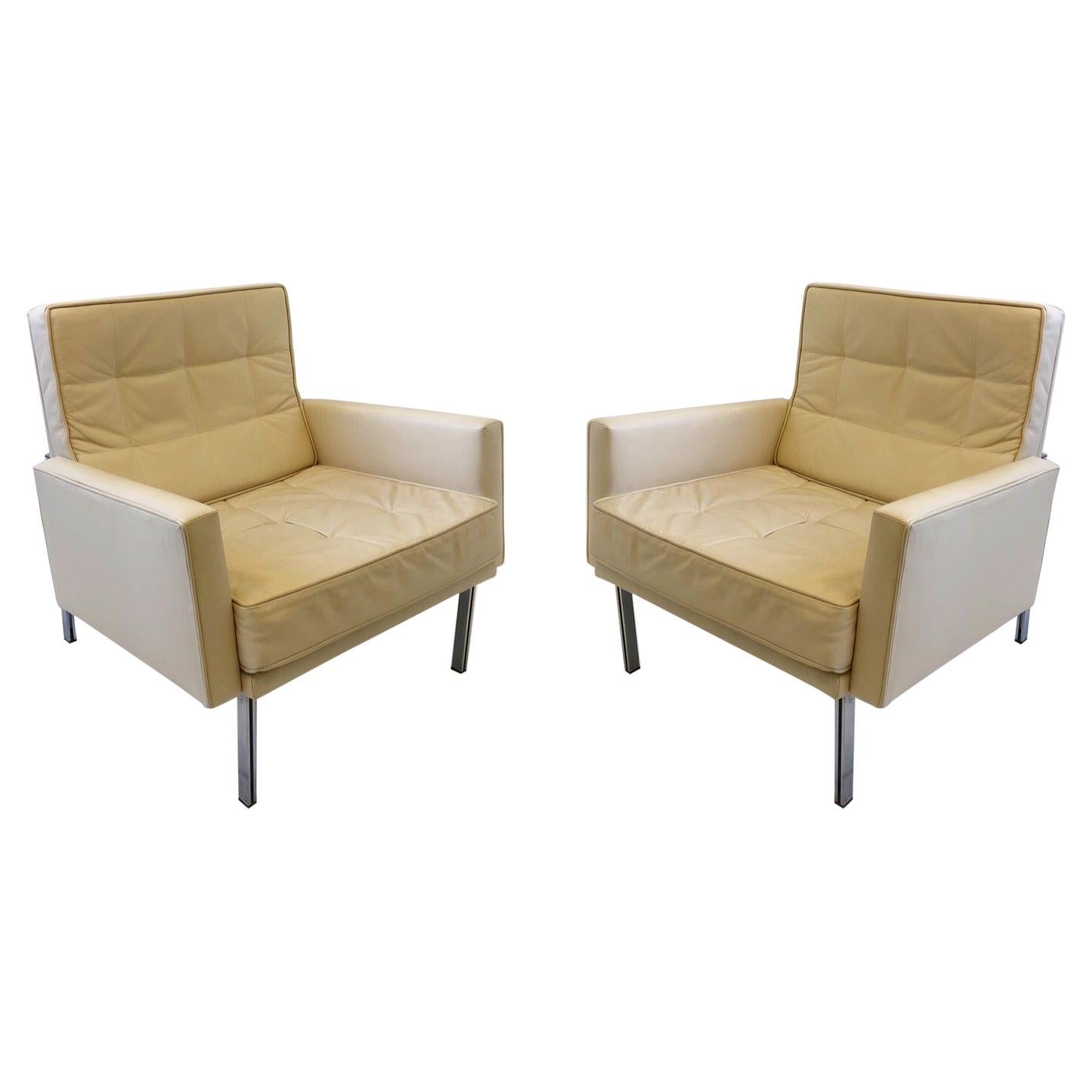 Pair of off White Leather and Stainless Steel Lounge Chairs by Florence Knoll