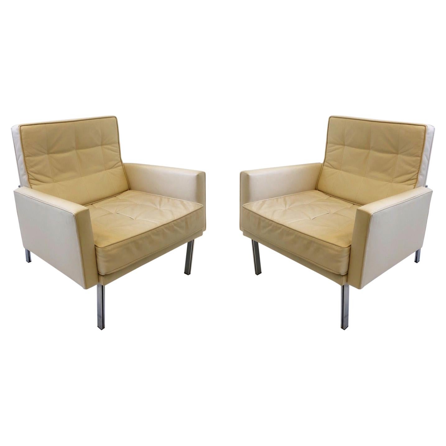 Pair of off White Leather and Stainless Steel Lounge Chairs by Florence Knoll For Sale