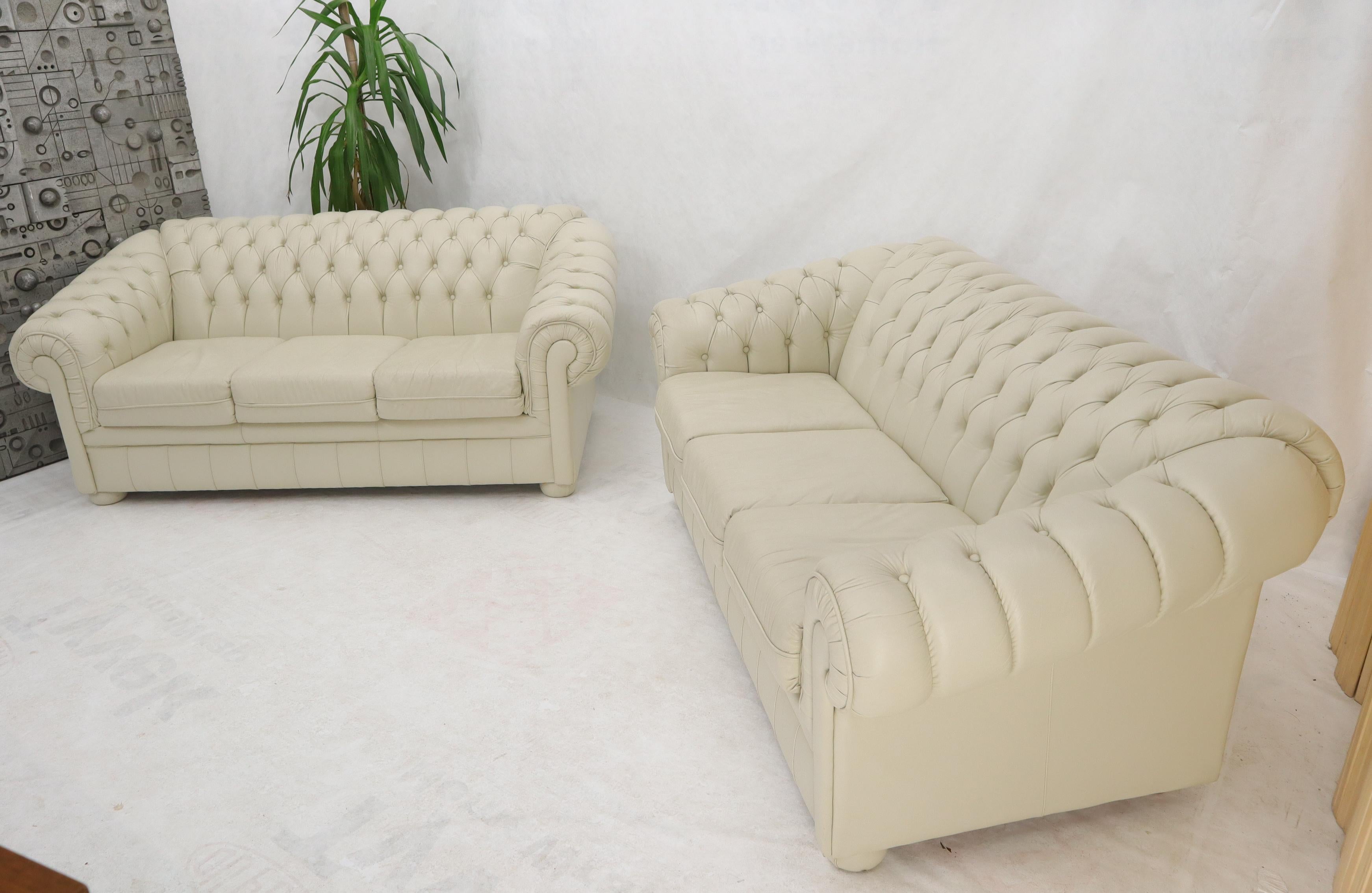 Mid-Century Modern Pair of Off-White Leather Upholstery Tufted Chesterfield Sofas Couches