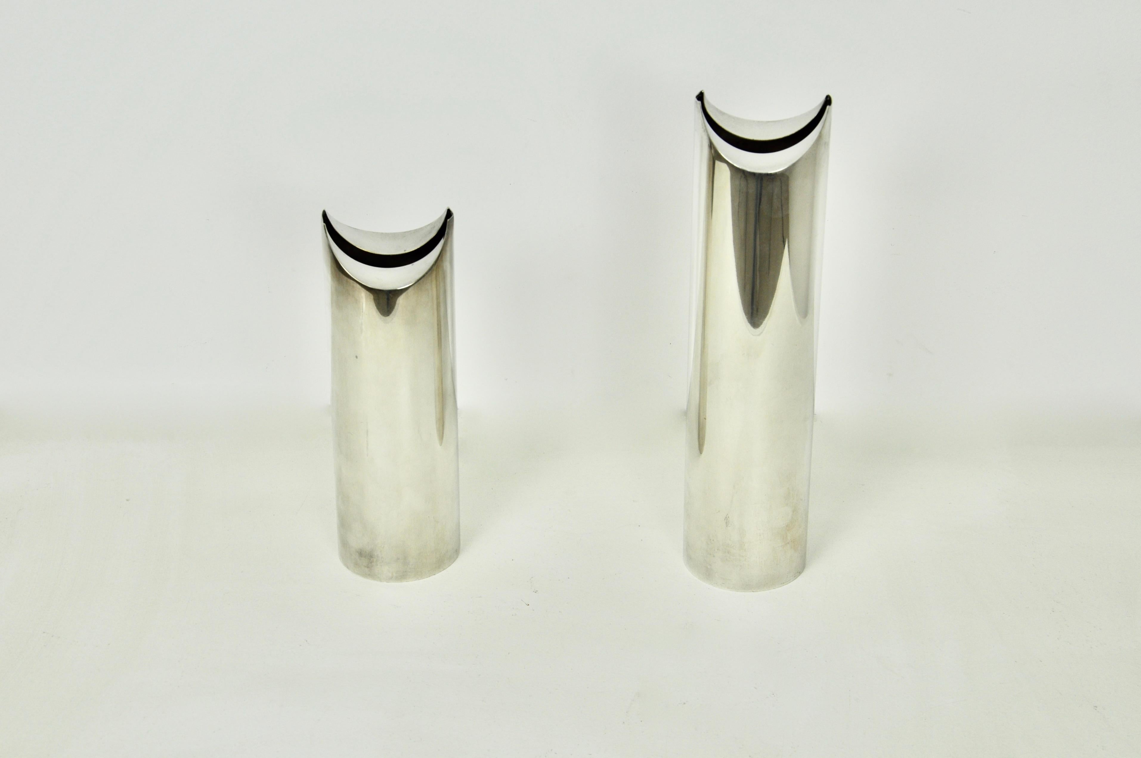 Pair of vases stamped Sabattini. Measures: Different height 36cm and 27cm. Normal patina due to time and age of the vases.