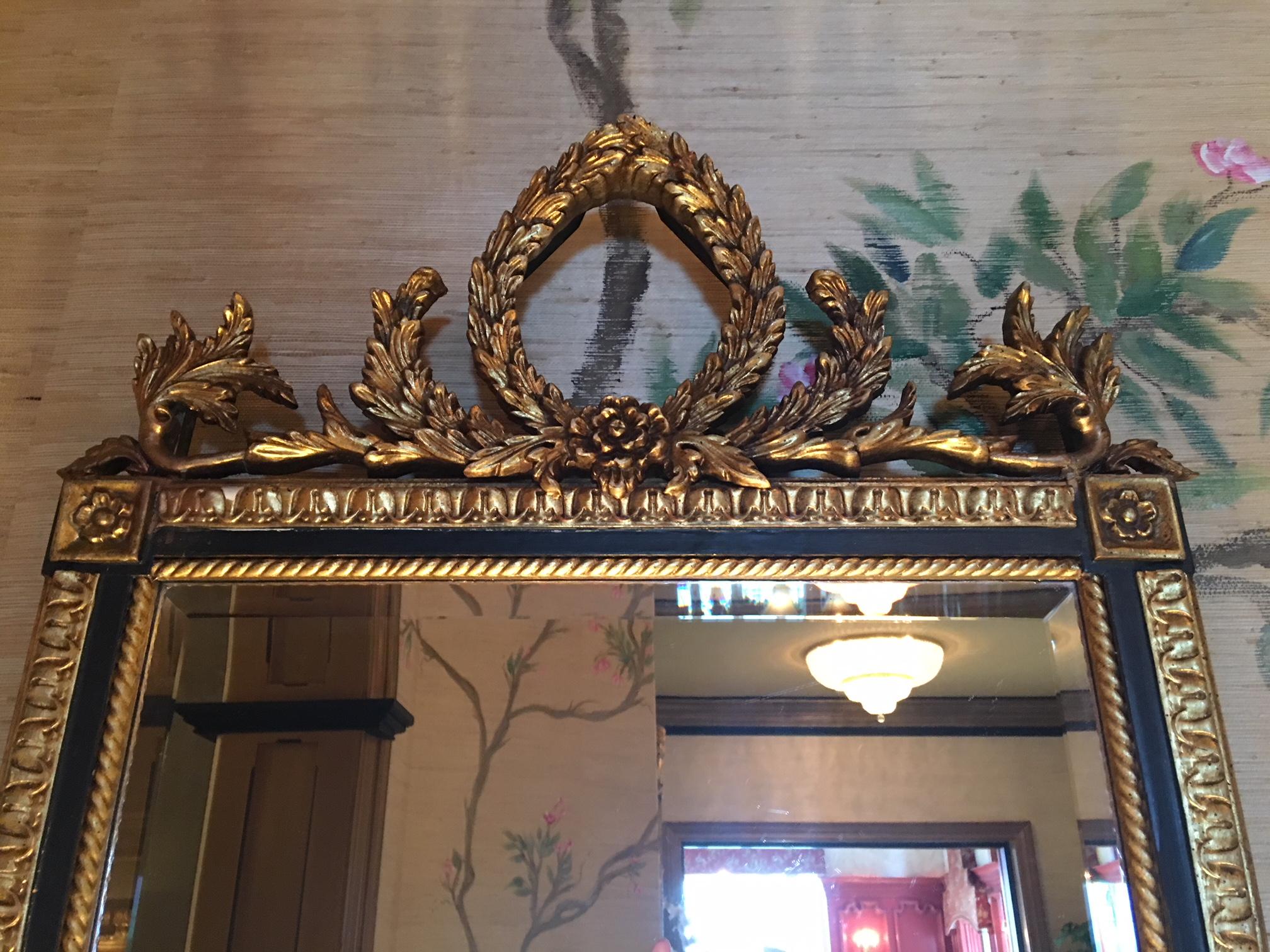 Pair of Oil Gilt and Black Mirrors Adorned with a Floral Crown, 20th Century  In Good Condition In Savannah, GA