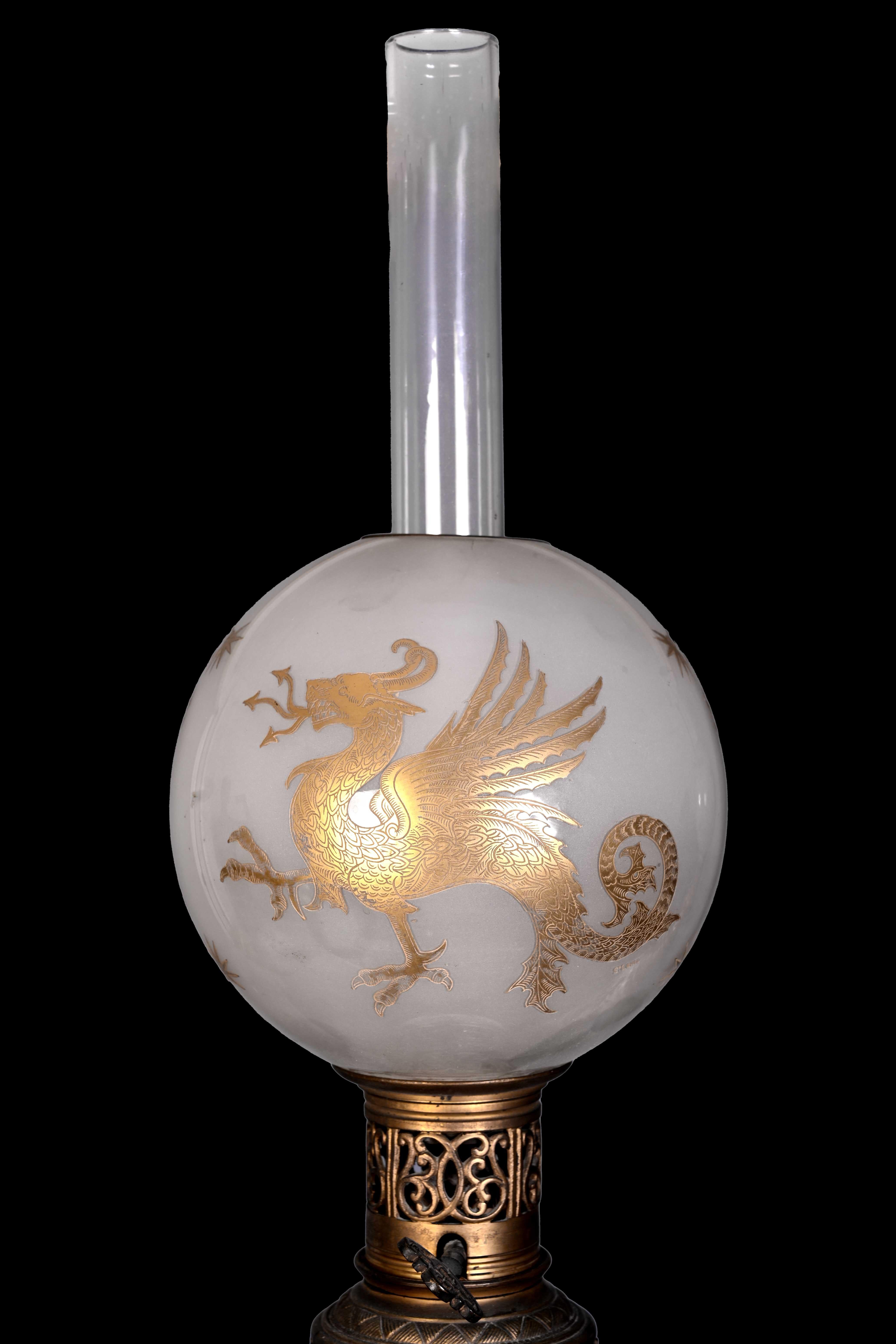 A superb and rare pair of Japanese oil lamps dating from the second half of the 19th century. The bases are made from Satsuma faience vases, richly decorated with polychrome enamels depicting detailed samurai scenes. The opaline glass globes,