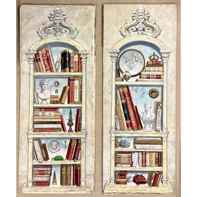 A pair of oil on canvas standing wall decorations. Two complimentary wall panels nine feet high on canvas each depicting a group of objects in a pair of Swedish bookcases. These stunning monumental wall panels can either hang on your wall or stand