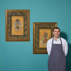 Pareja de óleos con escudos heráldicos familiares