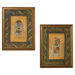 Pareja de óleos con escudos heráldicos familiares