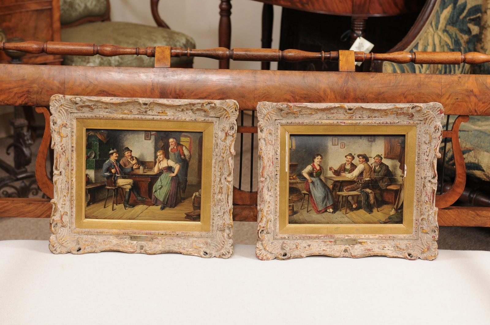 Paire de peintures à l'huile sur carton encadrées représentant des scènes de taverne, signées et datées 