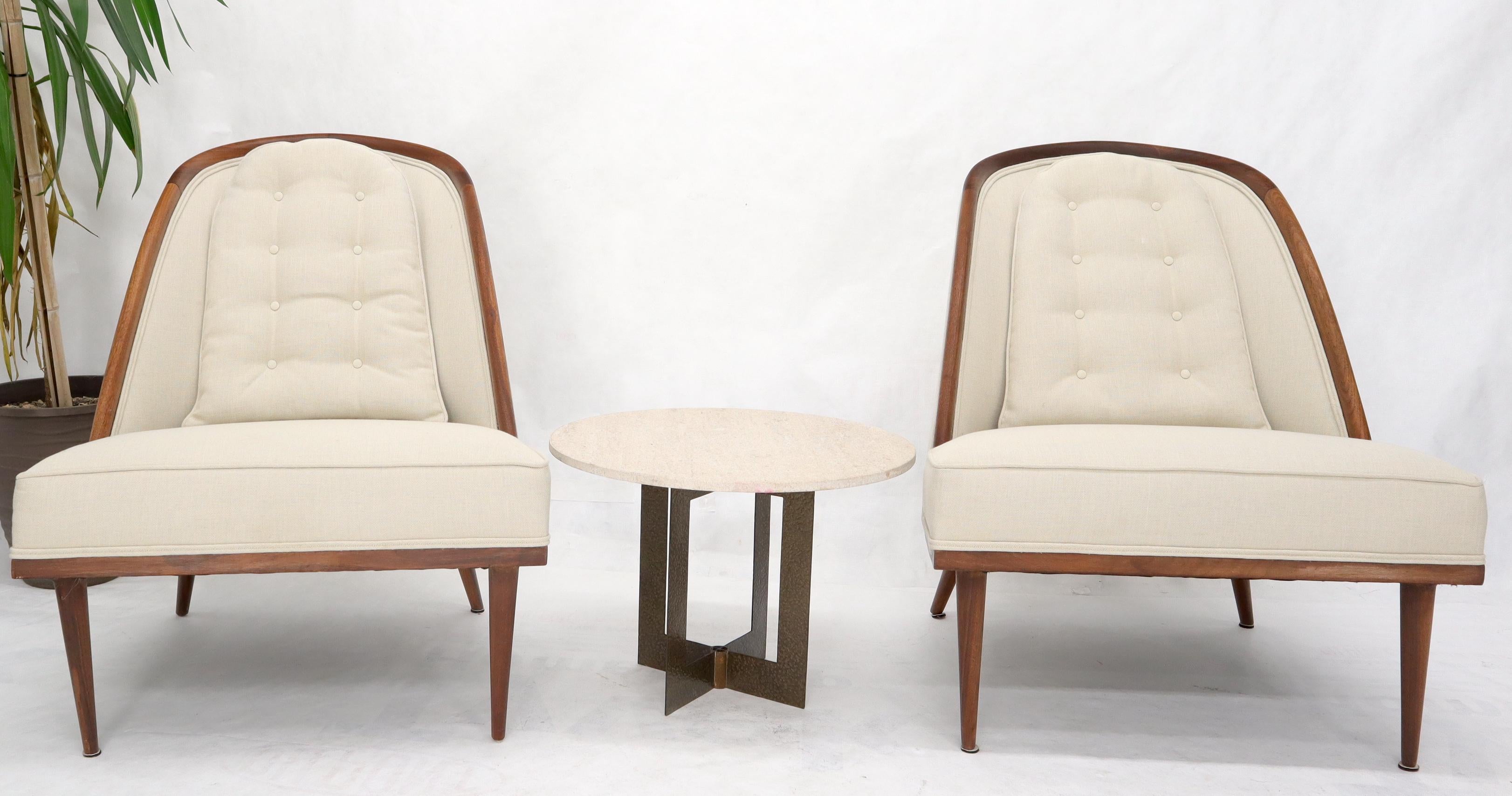 Tongue shape backs oiled walnut frames Mid-Century Modern lounge chairs. Paul McCobb decor match.