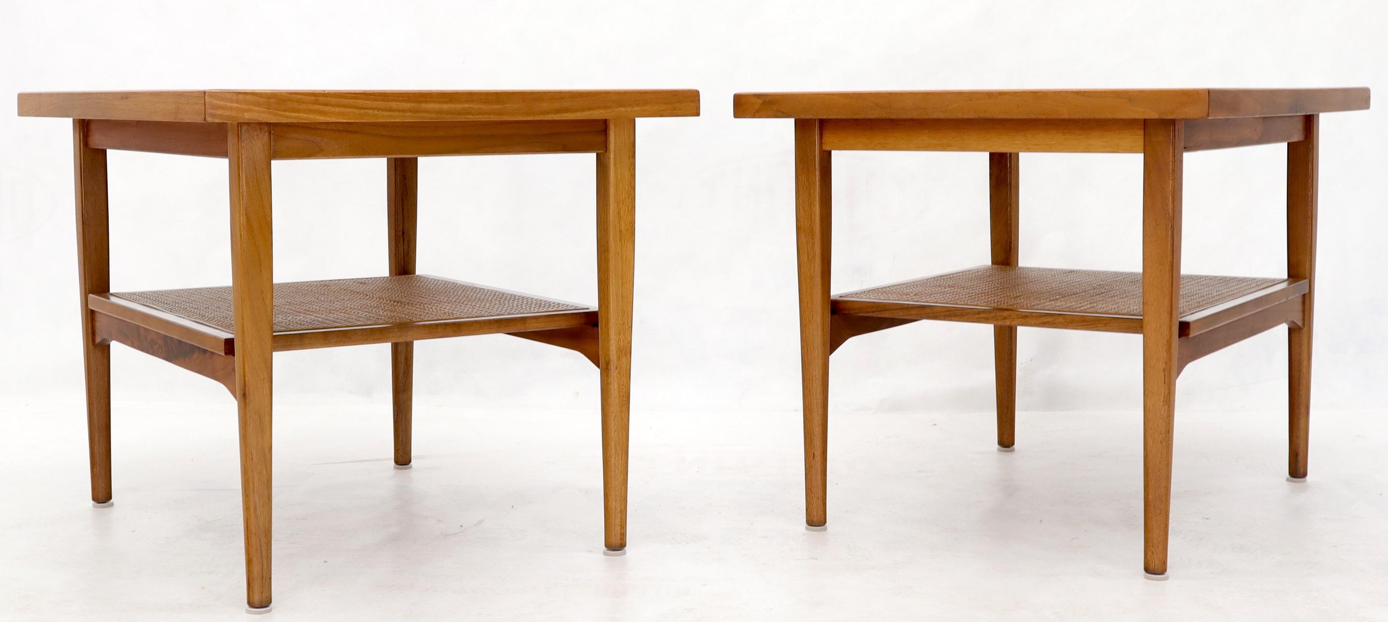 Pair of Mid-Century Modern oiled walnut end tables. Very clean original condition.