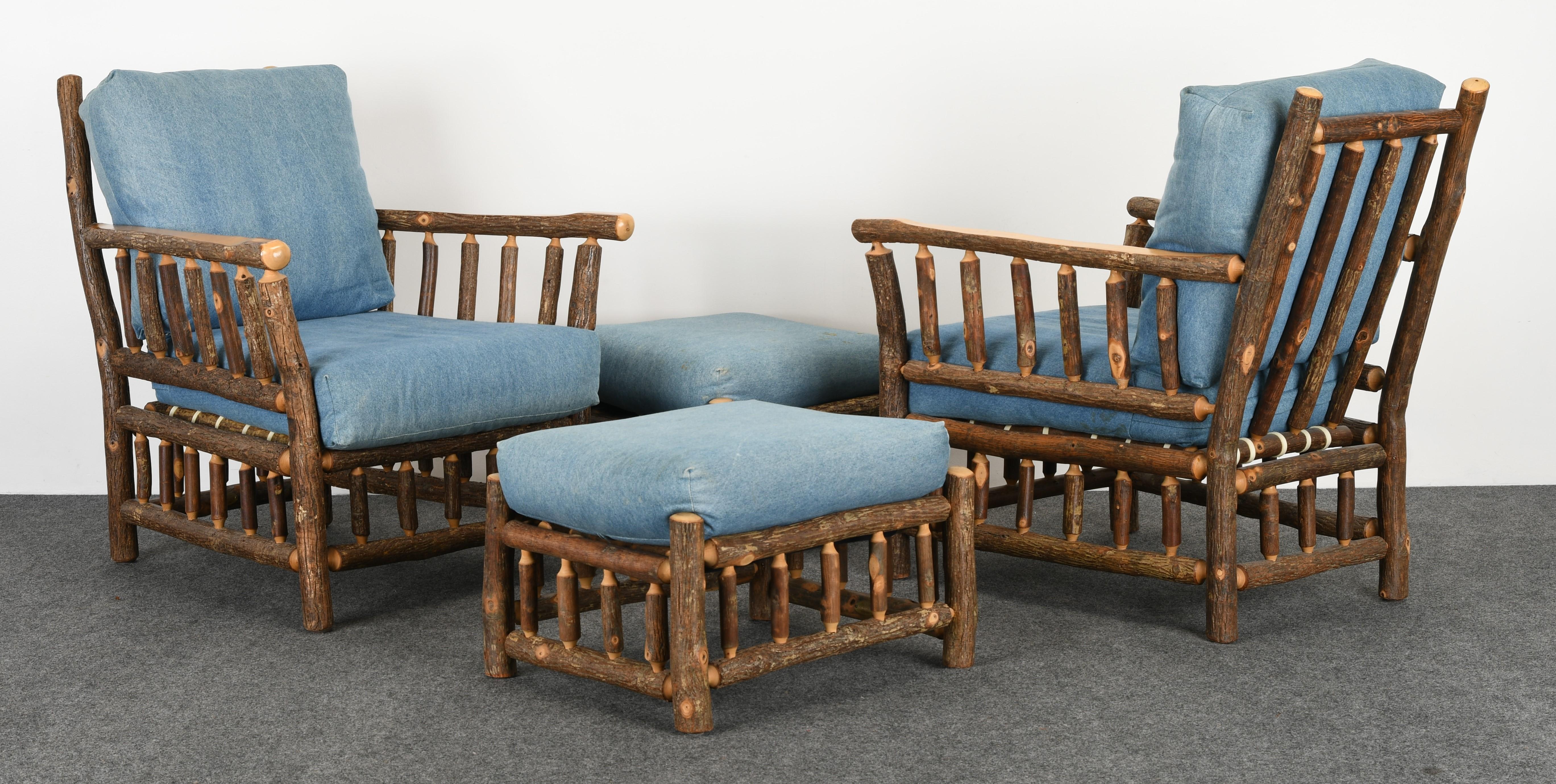 A fabulous rustic pair of armchairs with matching ottomans. These chairs would look great in a sunroom, porch, or second home. Old Hickory was known to be the furniture of choice for vacation homes by Theodore Roosevelt and other past presidents.