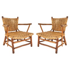 Paire de vieux fauteuils tissés en vieux pacanier