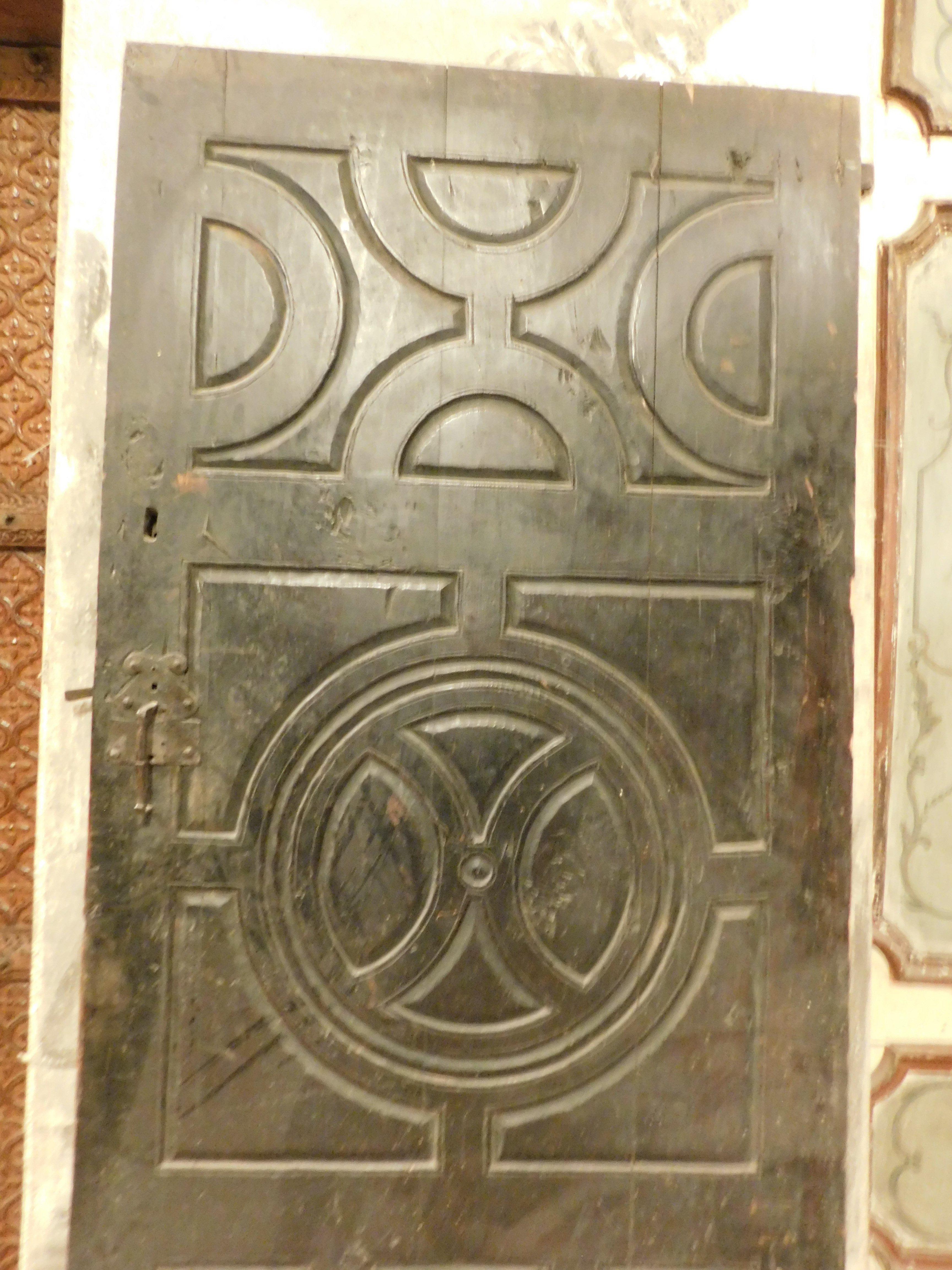Pair of old interior doors, black lacquered and carved, Italy 1