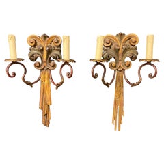Coppia di vecchie applique in legno policromo e ferro battuto del 1950 circa