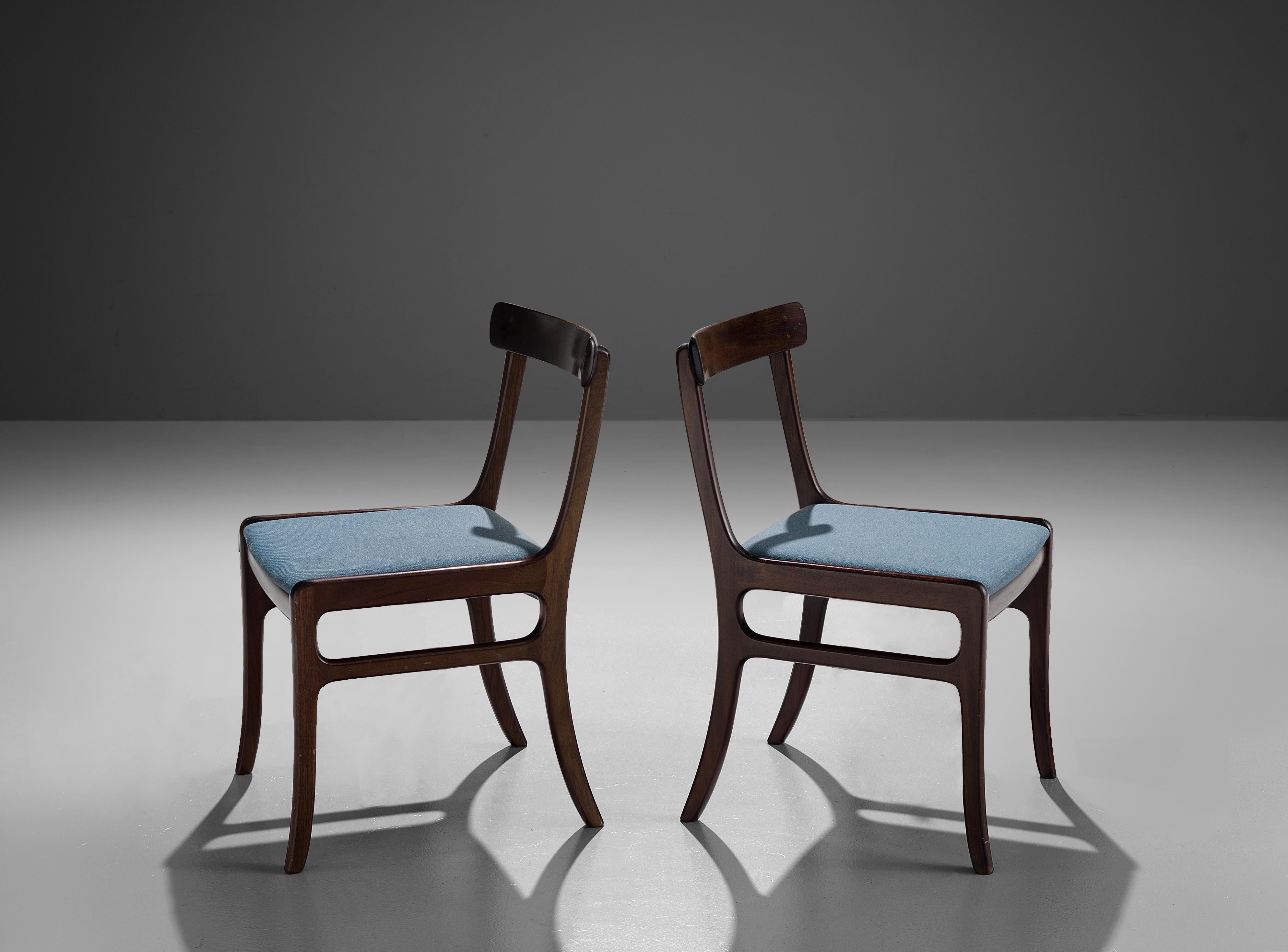 Ole Wanscher for P. Jeppesen, St. Heddinge, pair of dining chairs, model 'Rungstedlund' PJ 34, mahogany, blue upholstery, Denmark, 1960s.

These classic dining chairs are designed by the Danish designer Ole Wanscher features a slightly reclining