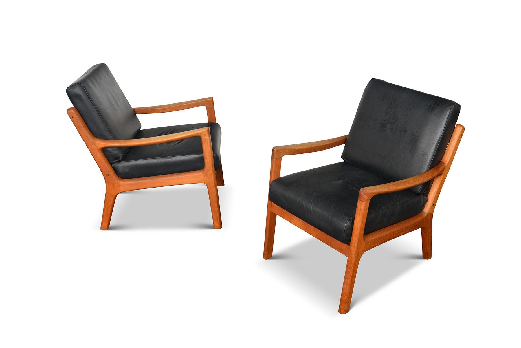The timeless style of the Senator chairs by Ole Wanscher will add the warmth of vintage to any modern home. The chairs feature an exquisite blend of solid teak and sumptuous black leather. Enjoy the quality that only 65+ years of craftsmanship can