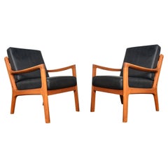 Pair of Ole Wanscher Senator Lounge Chairs in Teak + Black Leather