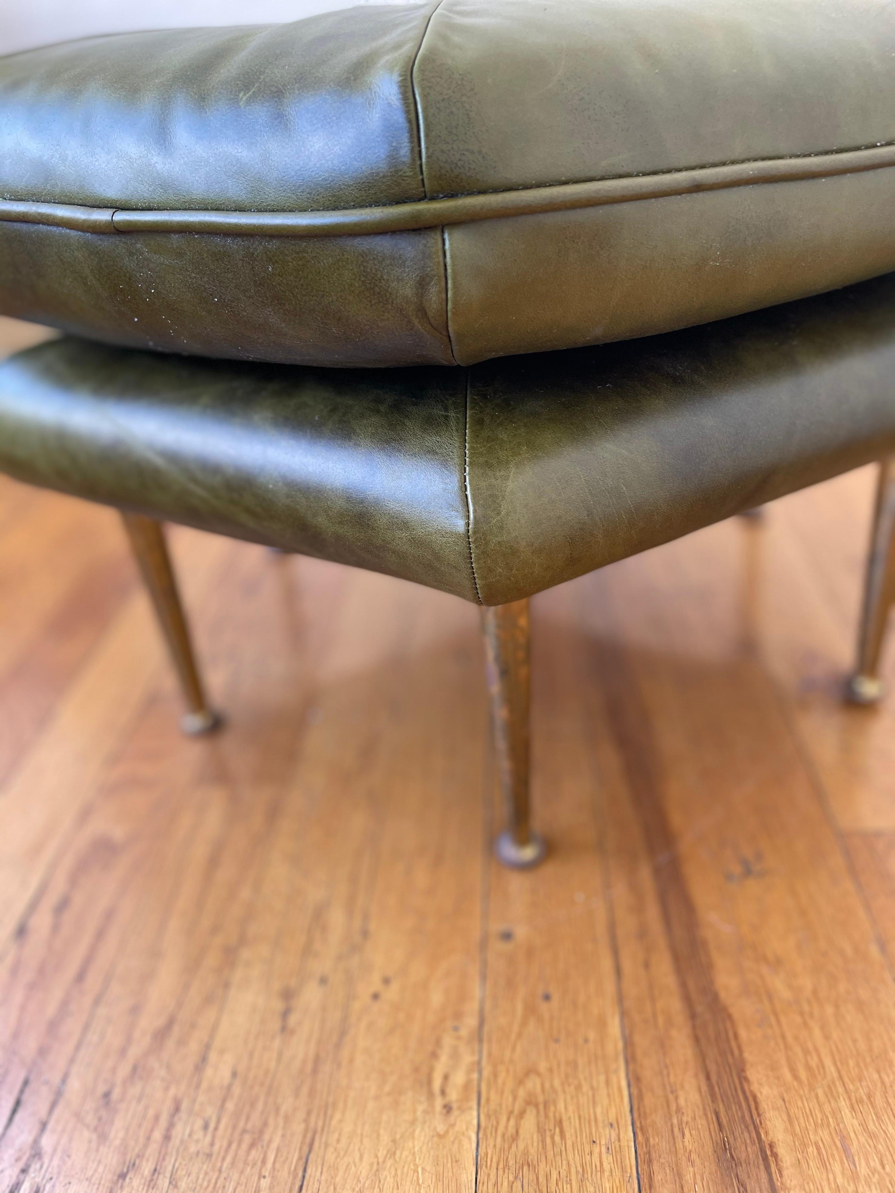A rare and beautiful pair of solid patinated brass legs, hexagon ottomans freshly upholstered in Italian Napa olive green Leather, circa 1950's incredible quality and design in the style of Gio Ponti.