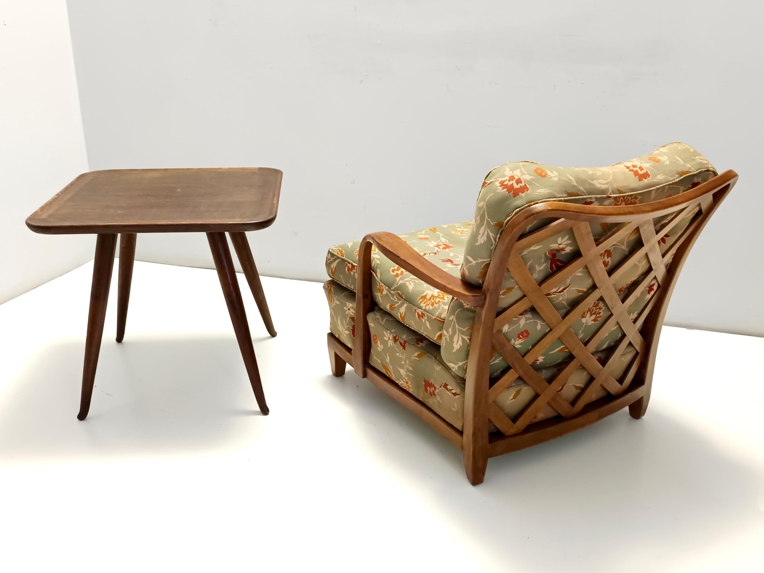 Made in Italy, 1940s. 
The armchairs feature a walnut frame and is upholstered in a high-quality olive green fabric, which is original and in excellent condition. 
They are probably realized by Mobilificio Quarti.
They might show slight traces of