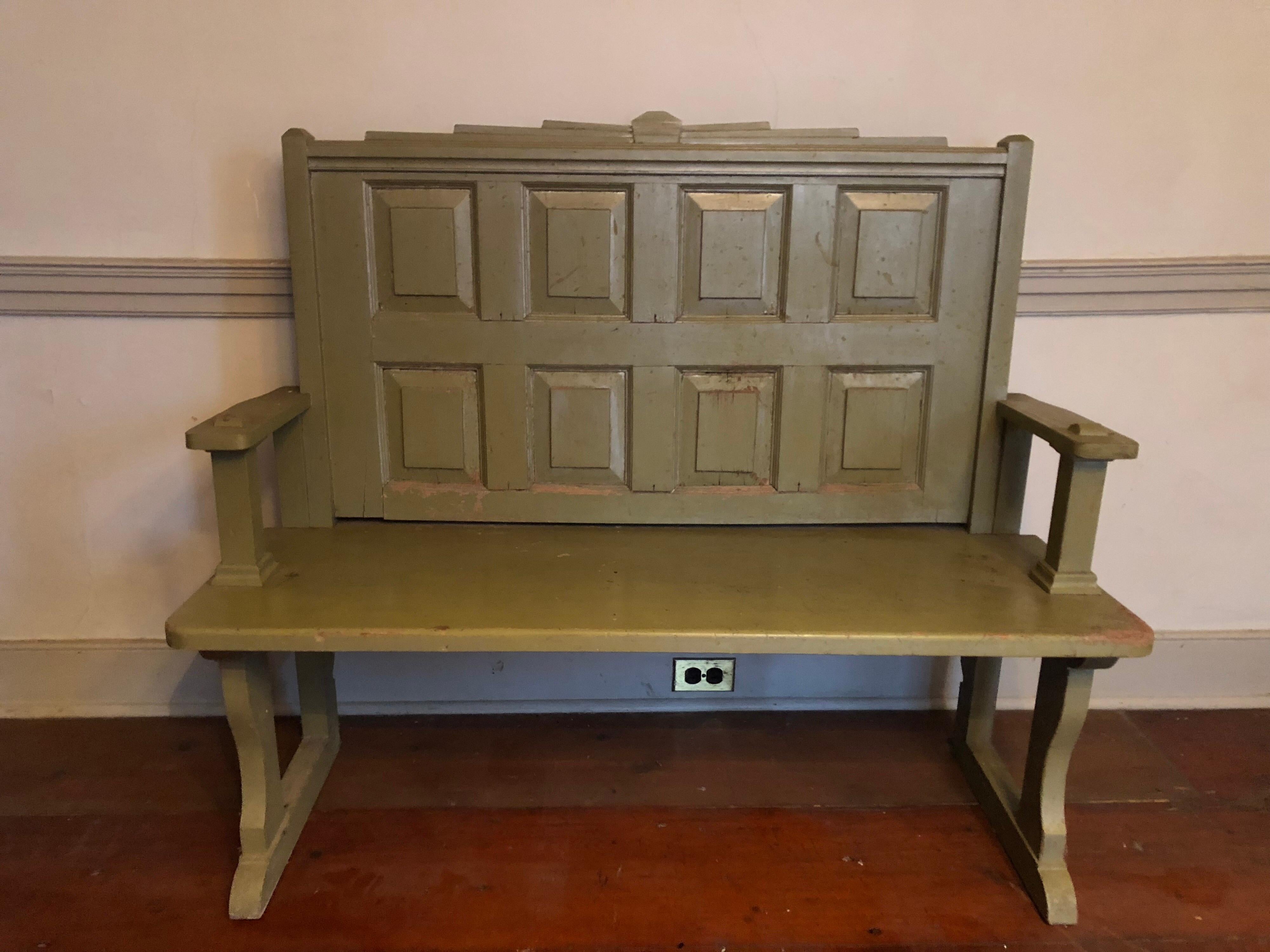 A pair of early 20th century American olive painted hall benches. Original untouched finish. Excellent and sturdy construction.