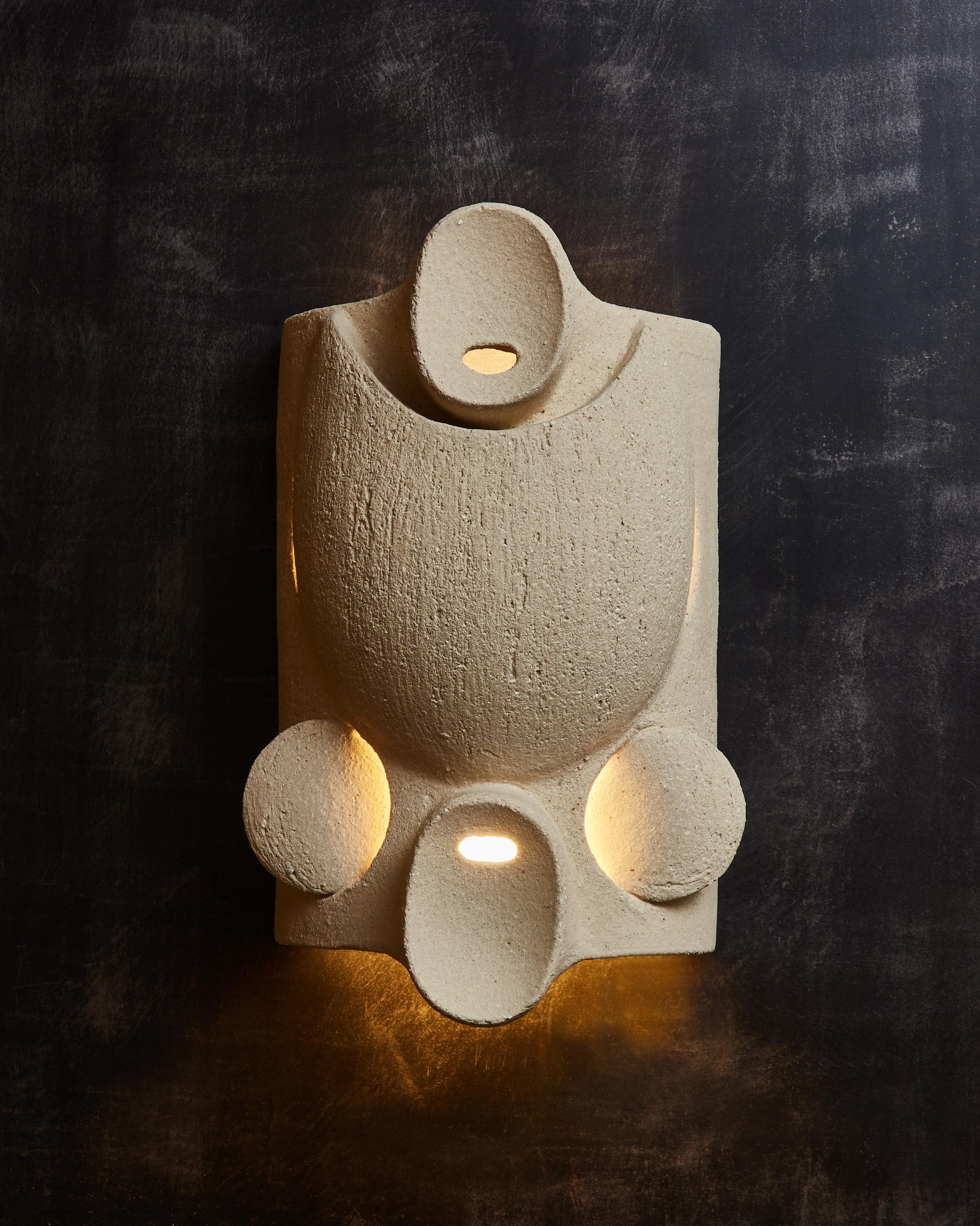 Curved ceramic wall sconces by Olivia Cognet

Since moving to Los Angeles in 2016, French artist and desi- gner Olivia Cognet has focused on ceramics as the fertile medium through which she expresses her boundless creativity. 
With the freedom