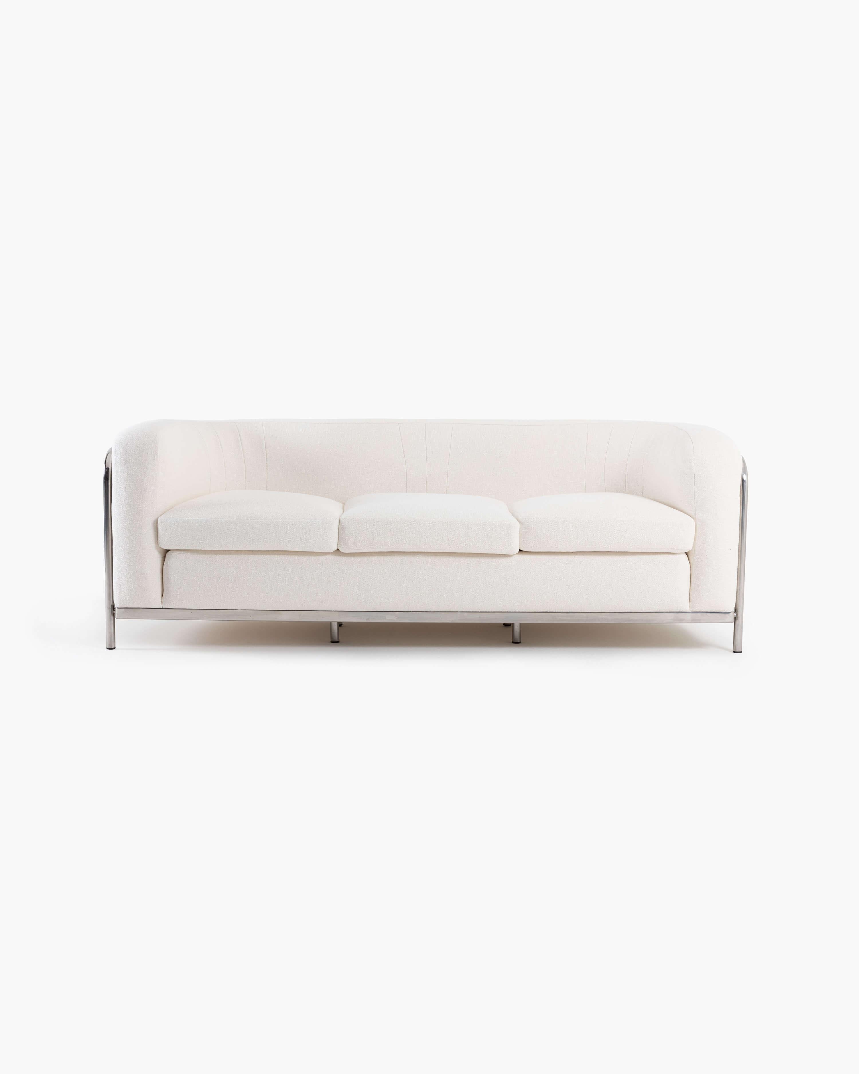 The Onda three-seat sofa–Onda meaning “wave” in Italian– by Jonathan De Pas, Donato D'Urbino and Paolo Lomazzi, earns its namesake from the tubular stainless steel frame that forms its support structure, curving in and out along the back of the