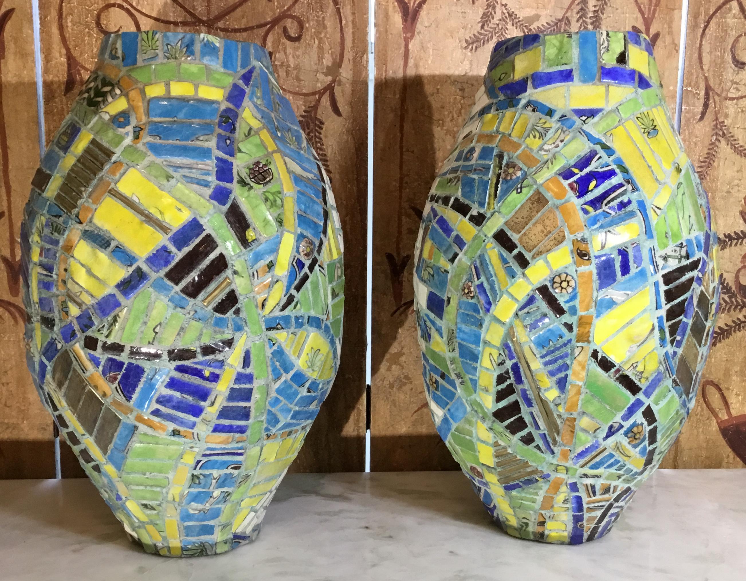 Beautiful pair of antique Turkish Vases artistically covered all around with ceramic fragment mosaic, colorful antique Persian ceramic, some brass pieces, and cream color antique Chinese Cizhou stoneware fragments from Ming dynasty. This pair could