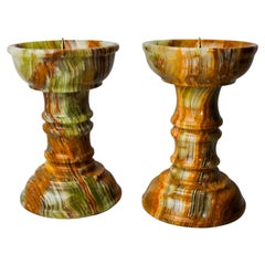 Pair of onyx and brass candlesticks, Italy, 1980