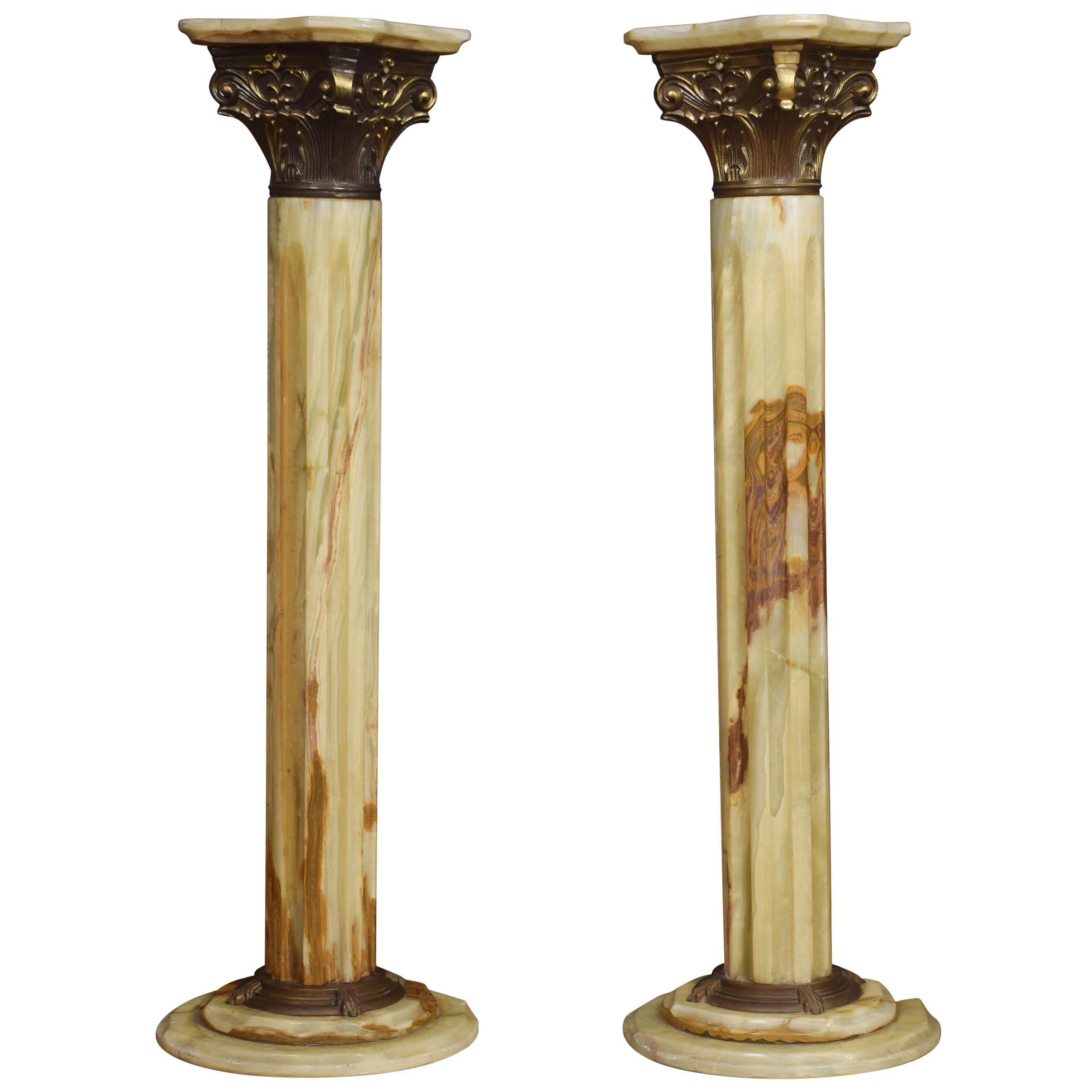 Pair of Onyx and Gilt Metal Mounted Pedestals