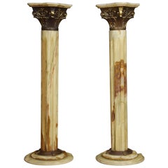 Pair of Onyx and Gilt Metal Mounted Pedestals