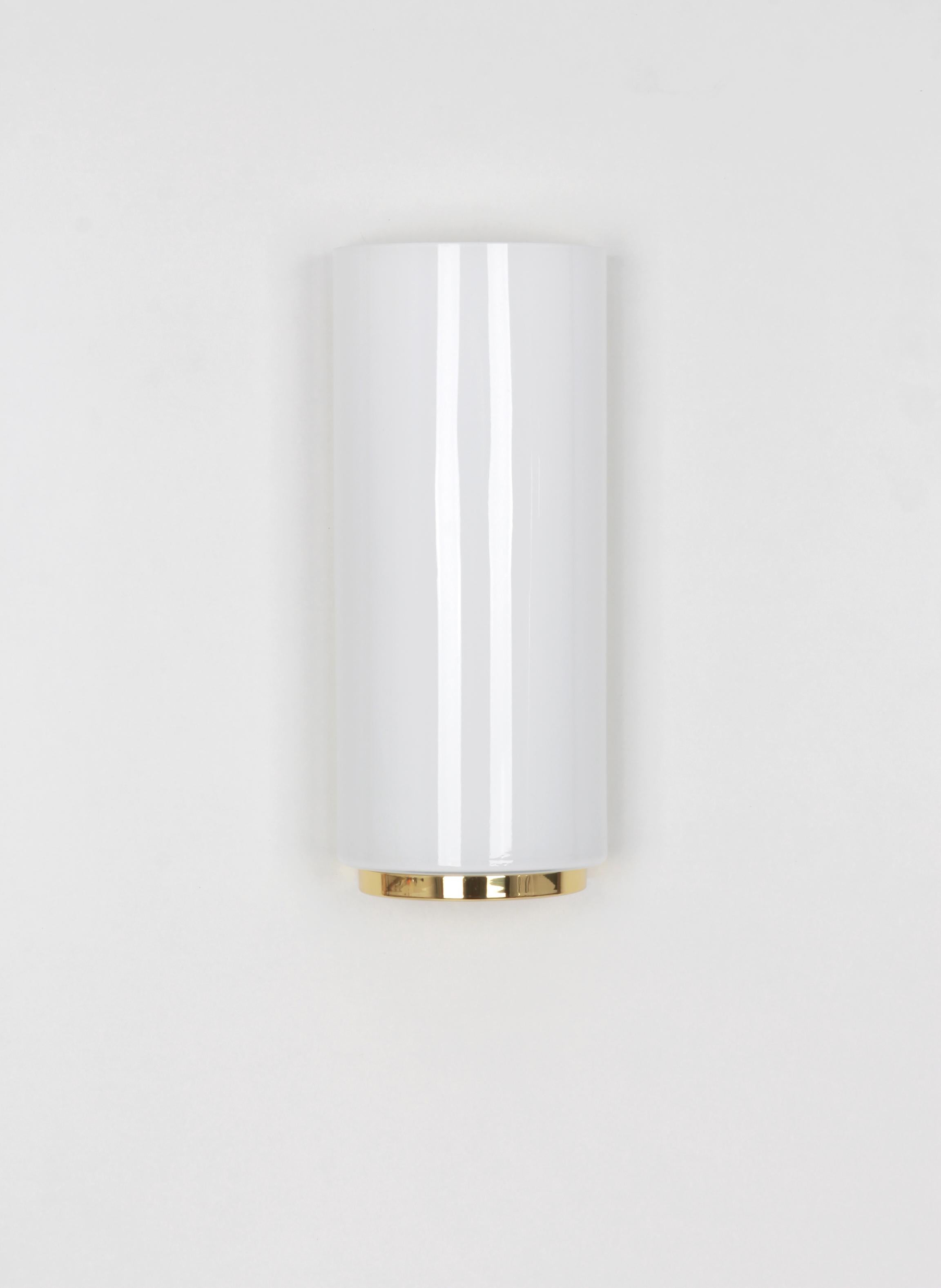 Stunning single opal white glass sconce made by Limburg on a brass frame.
Best of the 1970s from Germany

The price is for 1 wall light.
Only one item is still available.

Very good condition, with small signs of age and use on the base.