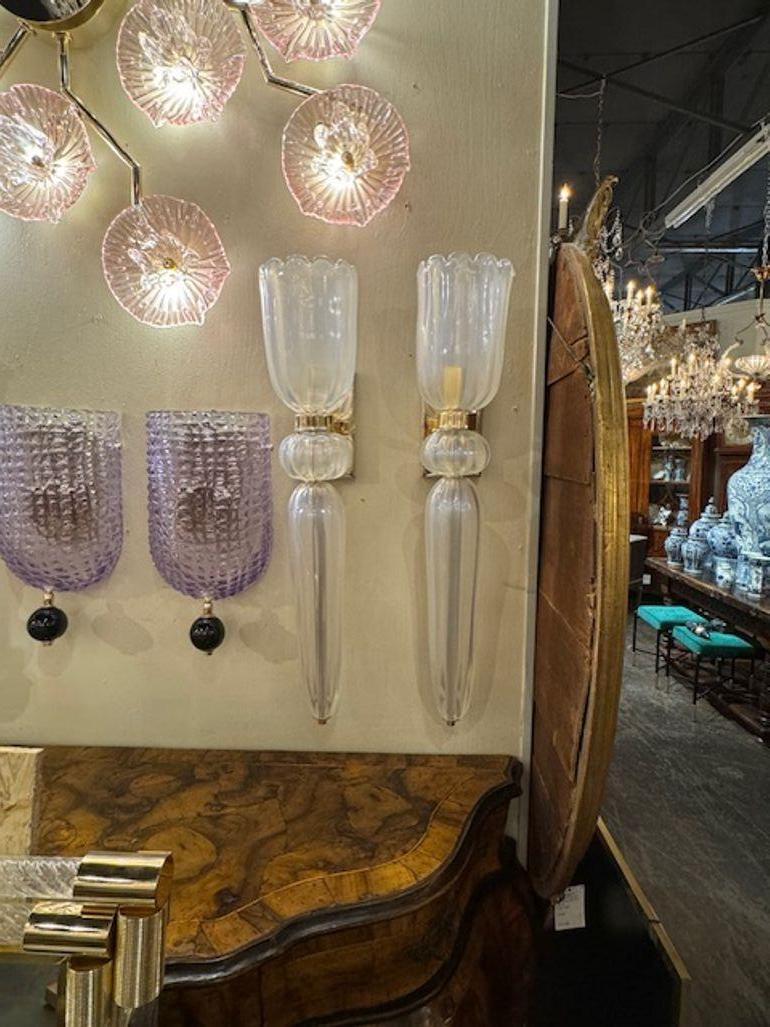 Elegant pair opalescent Murano glass cone form sconces on brass bases after Seguso. Creates a polished look!
27h x 5.5w x 8d