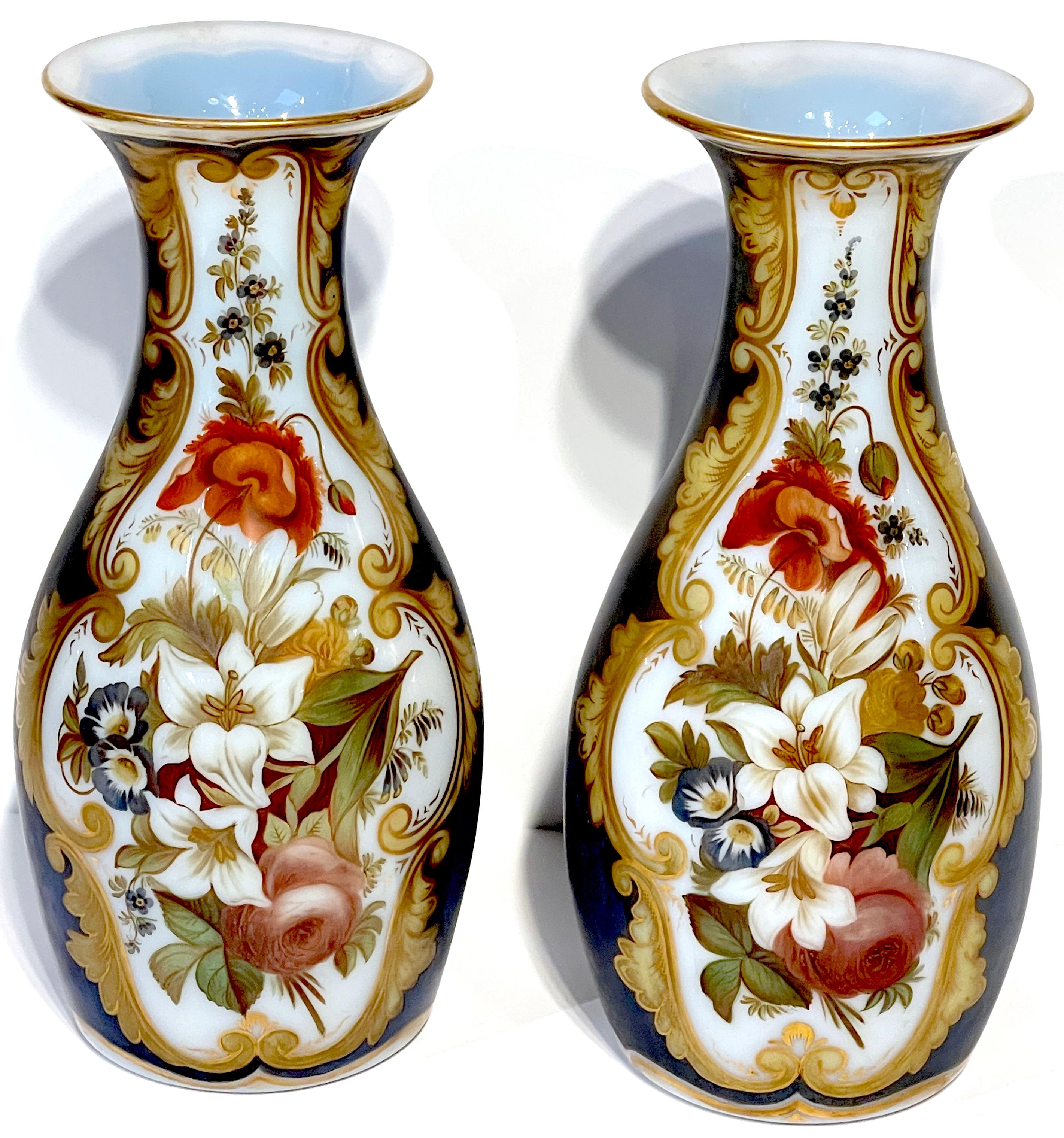 Pair of Opaline Floral Vases, Attributed Jean François Robert for Baccarat 
France, Mid 19th Century 

Jean-François Robert was a 19th Century French enamellist, active at Baccarat  1843-1855. 

Add to your collection with this exquisite pair of