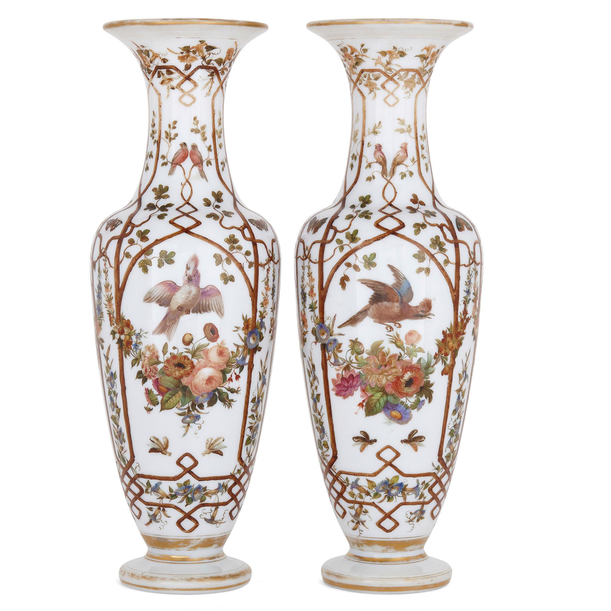 Pair of opaline glass vases painted with birds and flowers
French, 19th century
Measures: Height 40cm, diameter 14cm

These beautiful vases are an extremely fine examples of the production of 'opaline glass', a decorative style of glass