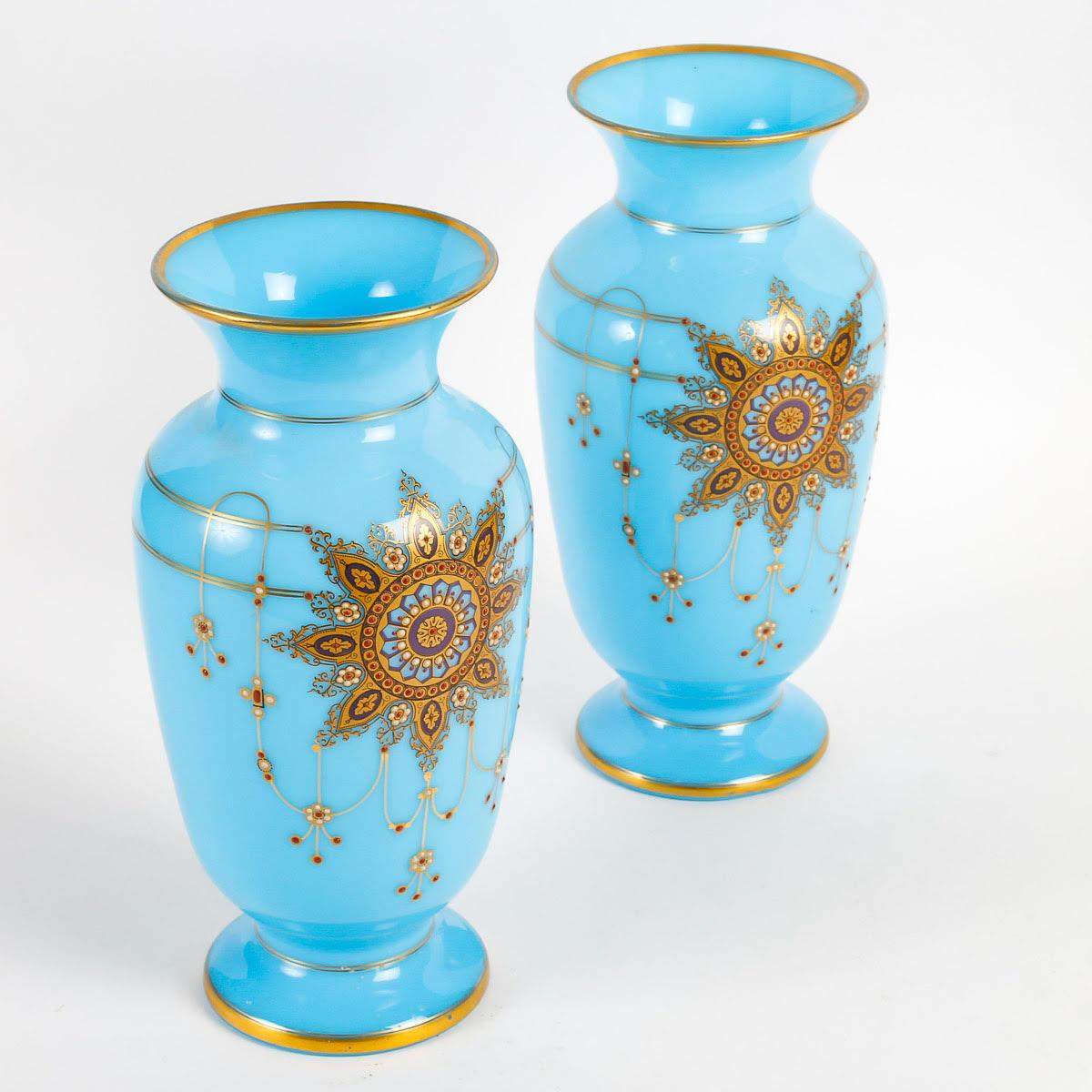 Pair of Opaline Vases, 19th Century, Napoleon III Style.

A pair of gold enamelled turquoise opaline vases, 19th century, Napoleon III period.
h: 30,5cm, d: 15cm
