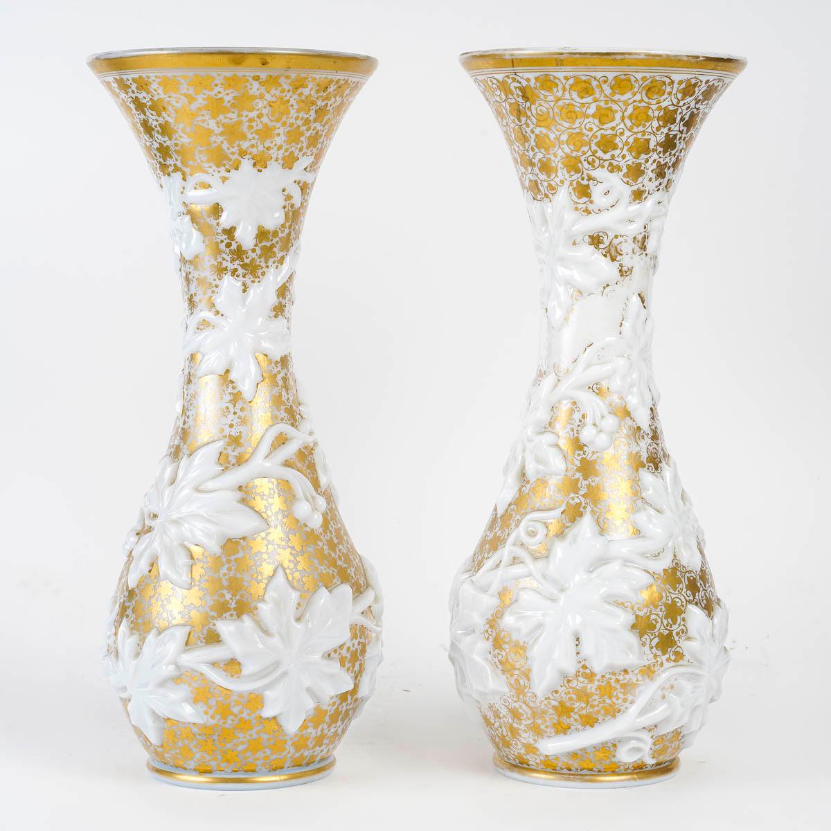 Pair of White Opaline Vases Enhanced with Gold, 19th Century, Napoleon III period.

A pair of white opaline vases with foliage in relief enhanced with gold, 19th century, Napoleon III period.
h: 42,5cm, d: 17cm