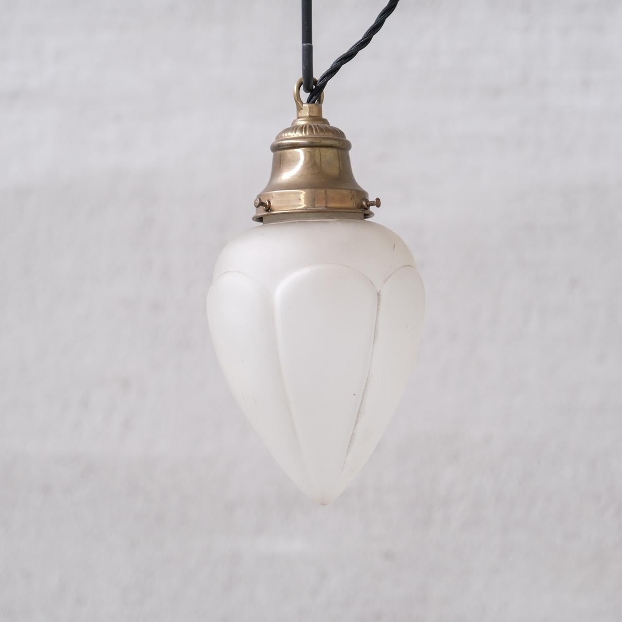 A pair of antique small pendants.

France, c1920s.

Opaque/etched glass pendant with brass gallery.

Price is for the pair.

No chain or rose was retained, however they are easy to source online.

Good vintage condtion, re-wired and PAT