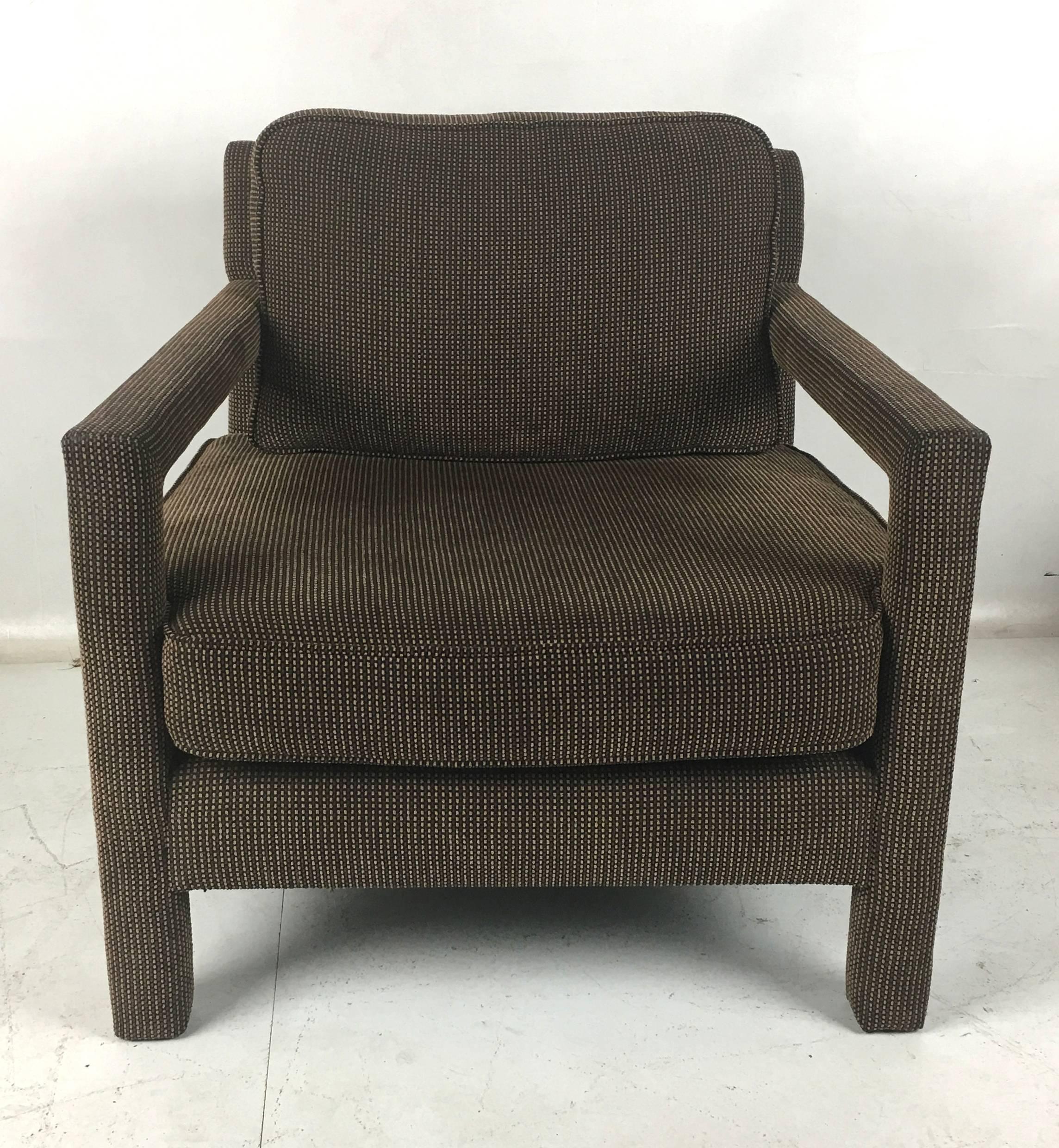 Handsome pair of fully upholstered, open-arm club chairs. The pair are beautifully scaled, super comfortable, and as stylish is it gets. Most every important designer had a version of this chair in their catalog, from Milo Baughman to John Dickinson
